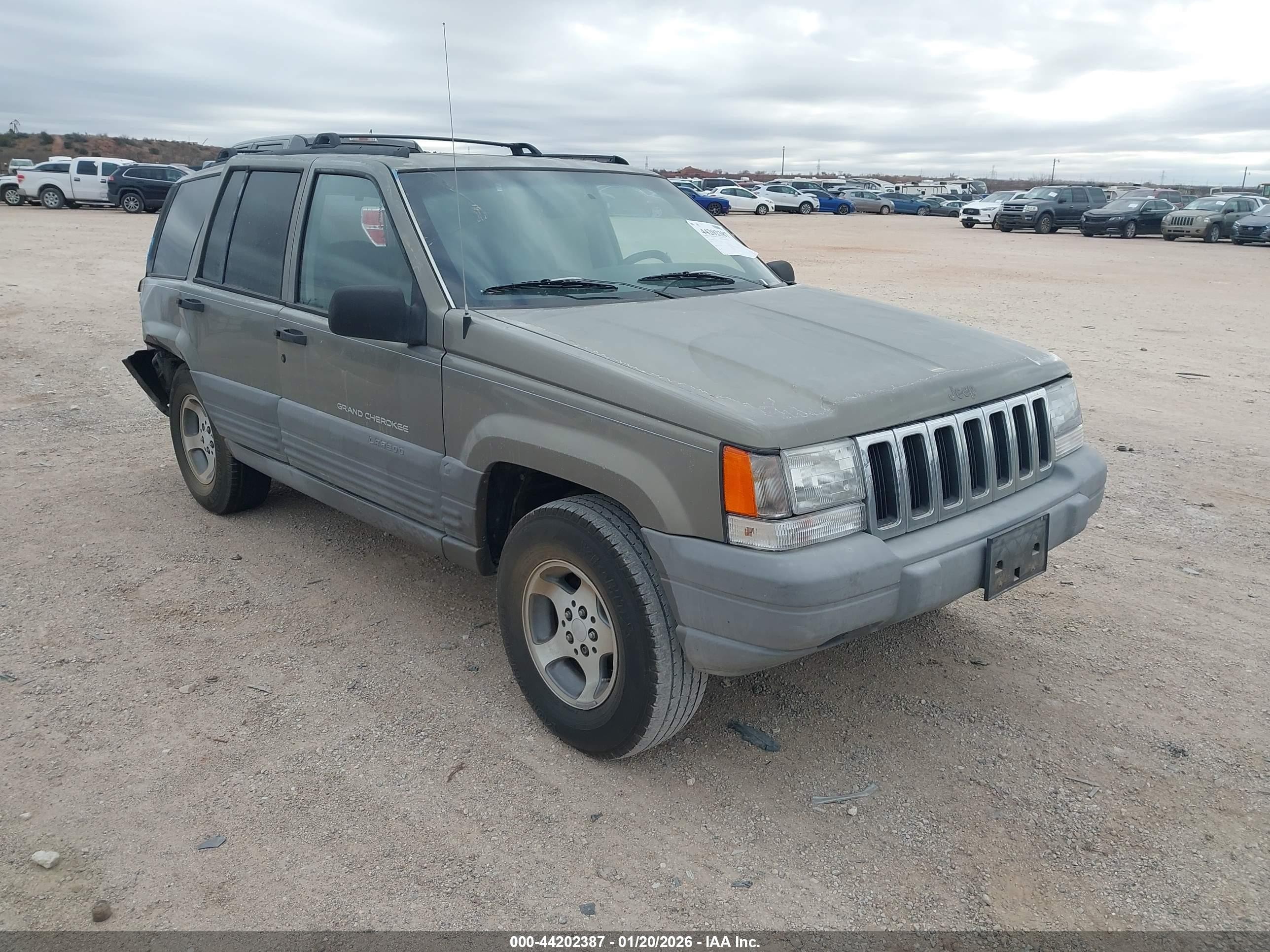 1997 Jeep Grand Cherokee Laredo/tsi Gold vin: 1J4FX58S1VC735403