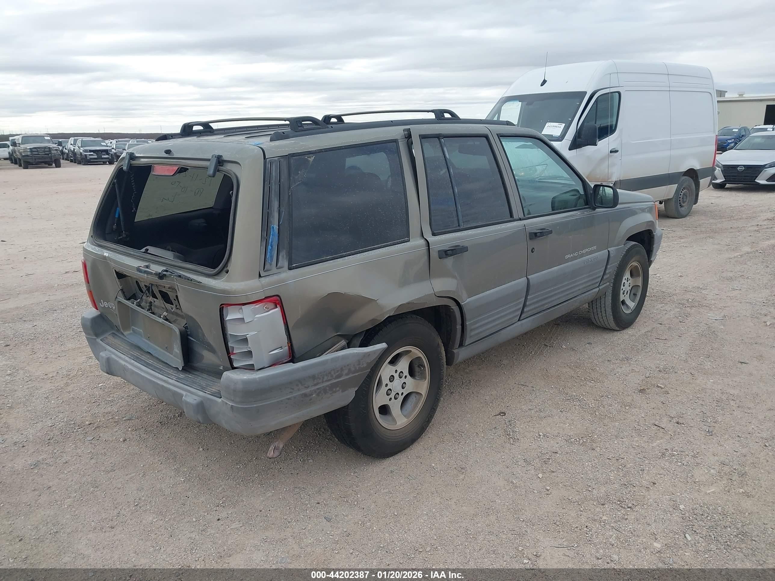 1997 Jeep Grand Cherokee Laredo/tsi Gold vin: 1J4FX58S1VC735403