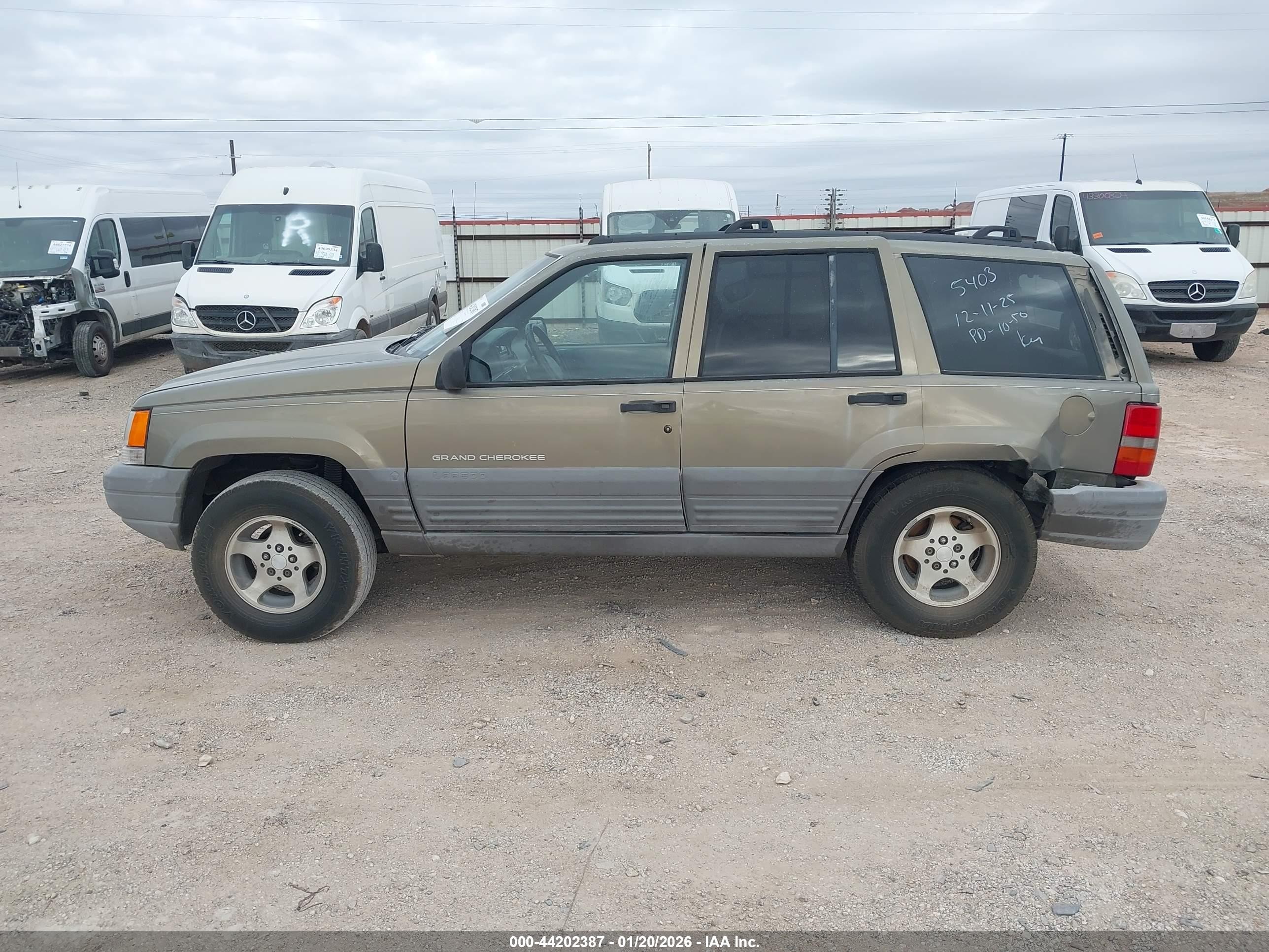 1997 Jeep Grand Cherokee Laredo/tsi Gold vin: 1J4FX58S1VC735403