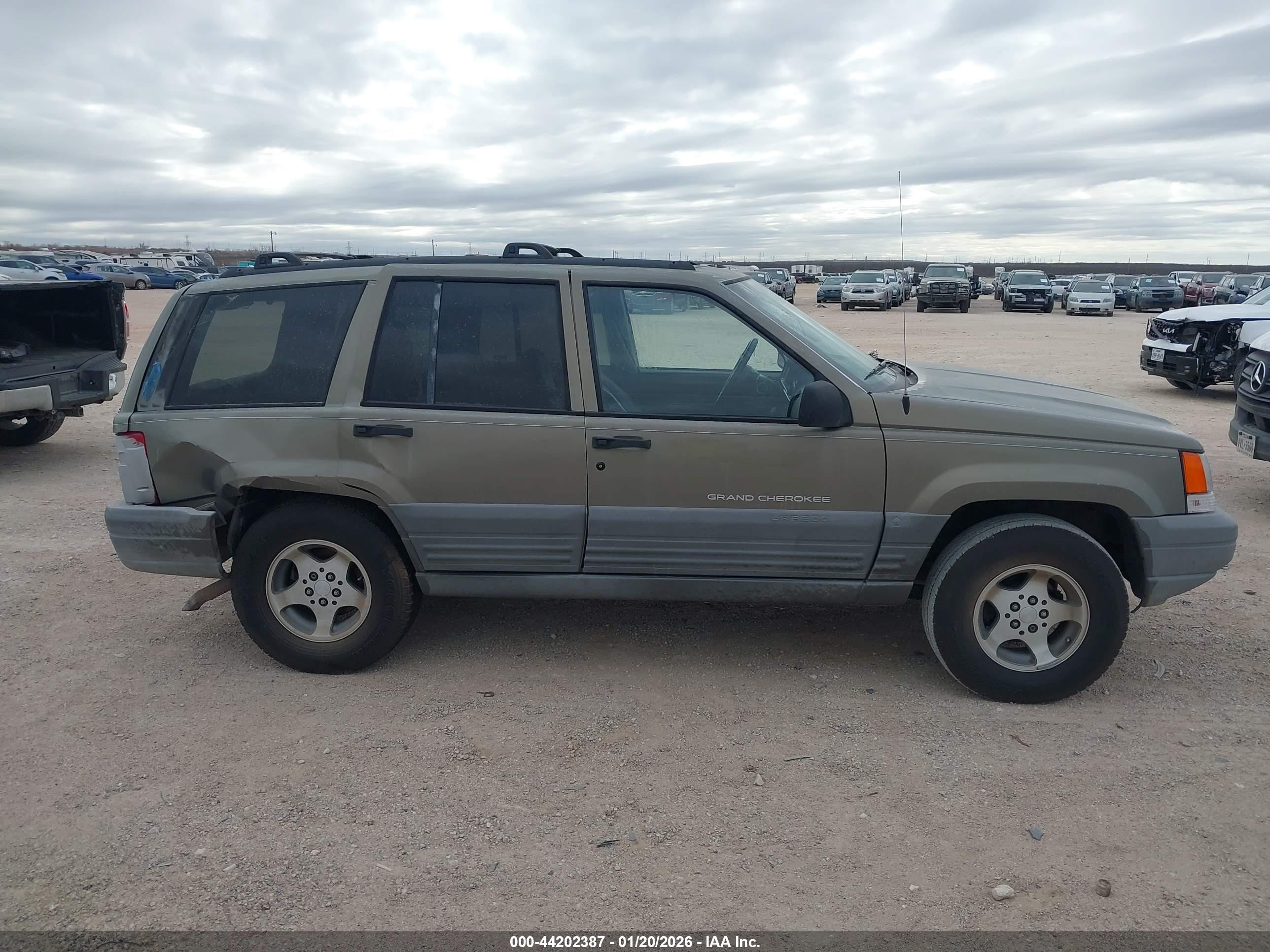 1997 Jeep Grand Cherokee Laredo/tsi Gold vin: 1J4FX58S1VC735403