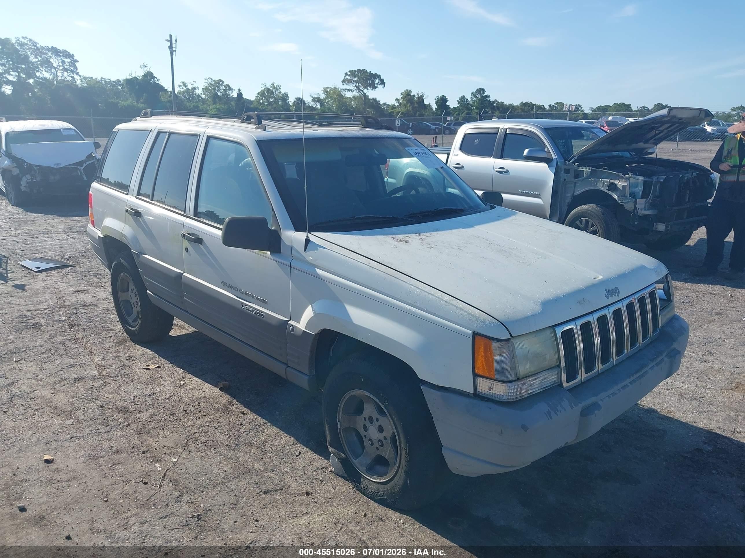 1997 Jeep Grand Cherokee Laredo/tsi Белый vin: 1J4FX58S2VC730906