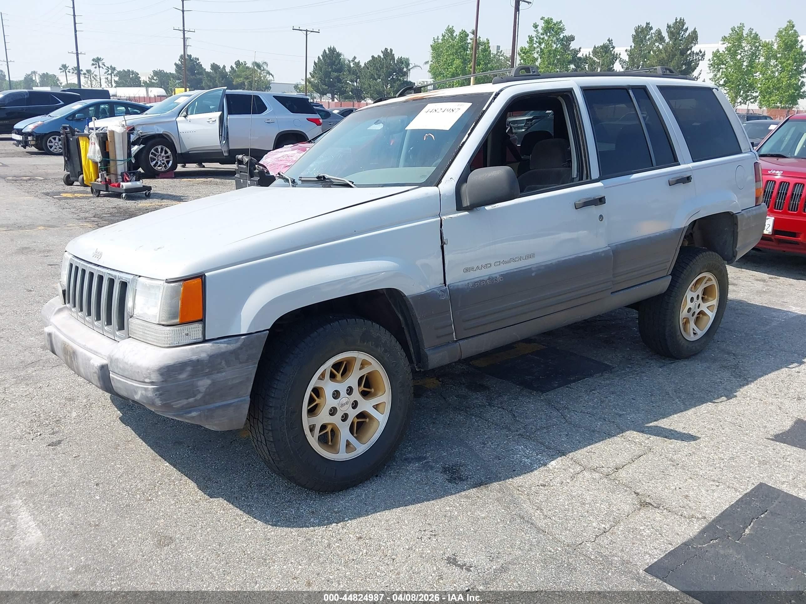 1996 Jeep Grand Cherokee Laredo Серый vin: 1J4FX58S8TC249796