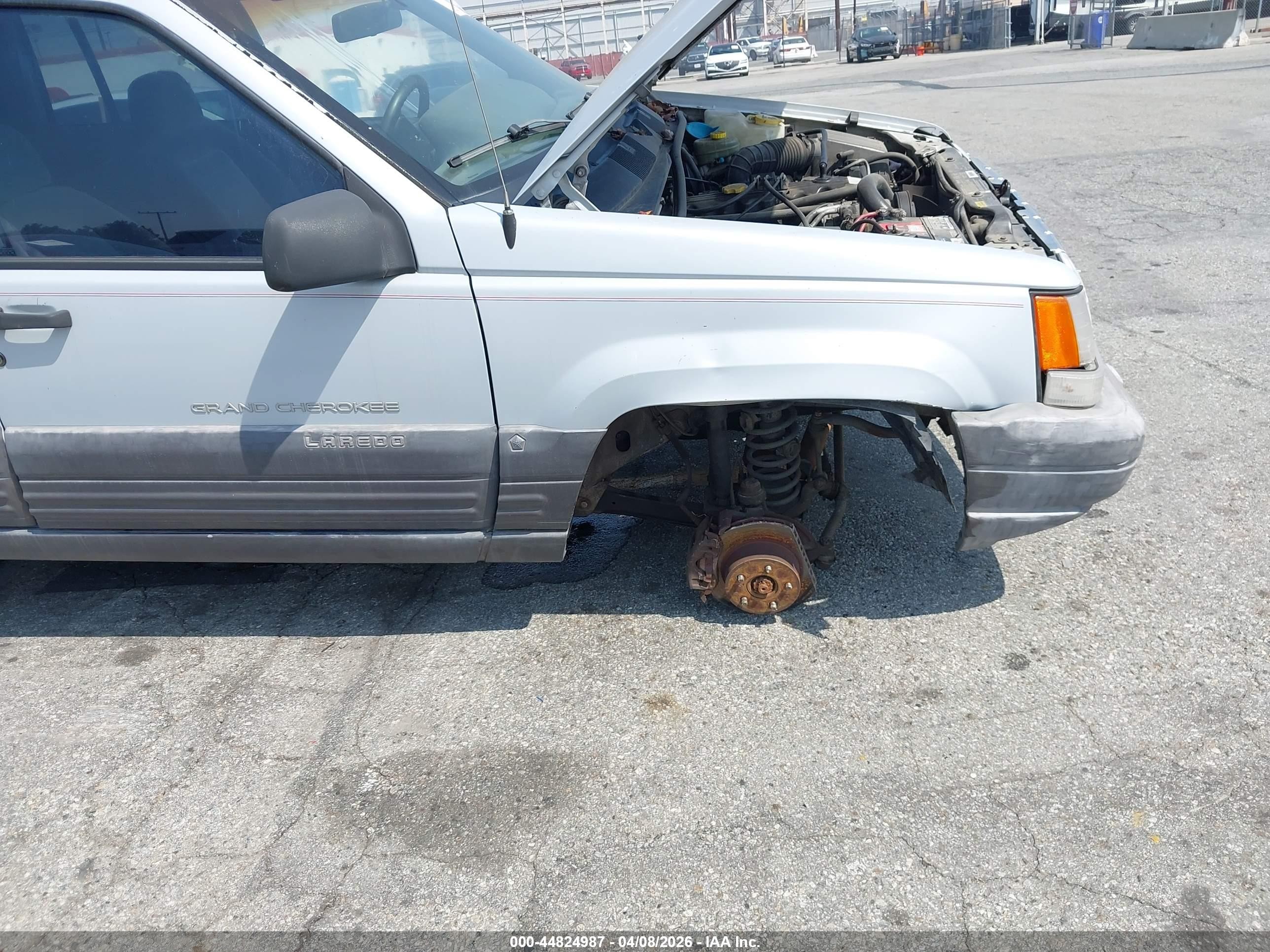 1996 Jeep Grand Cherokee Laredo Серый vin: 1J4FX58S8TC249796
