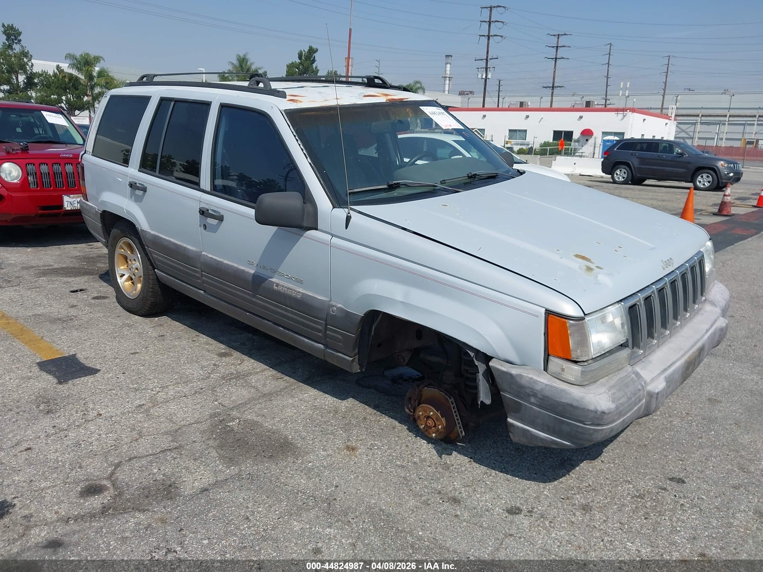 1996 Jeep Grand Cherokee Laredo Серый vin: 1J4FX58S8TC249796