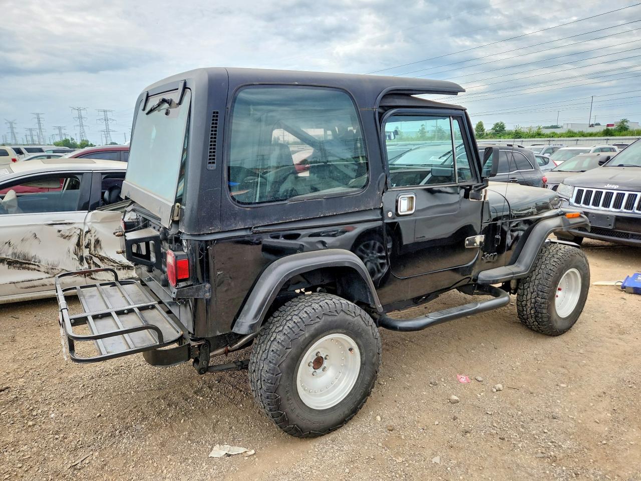 1993 Jeep Wrangler / Yj S Black vin: 1J4FY19P0PP215768