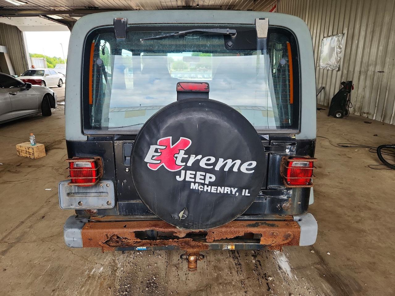 1999 Jeep Wrangler / Tj Sport Black vin: 1J4FY19S0XP471865