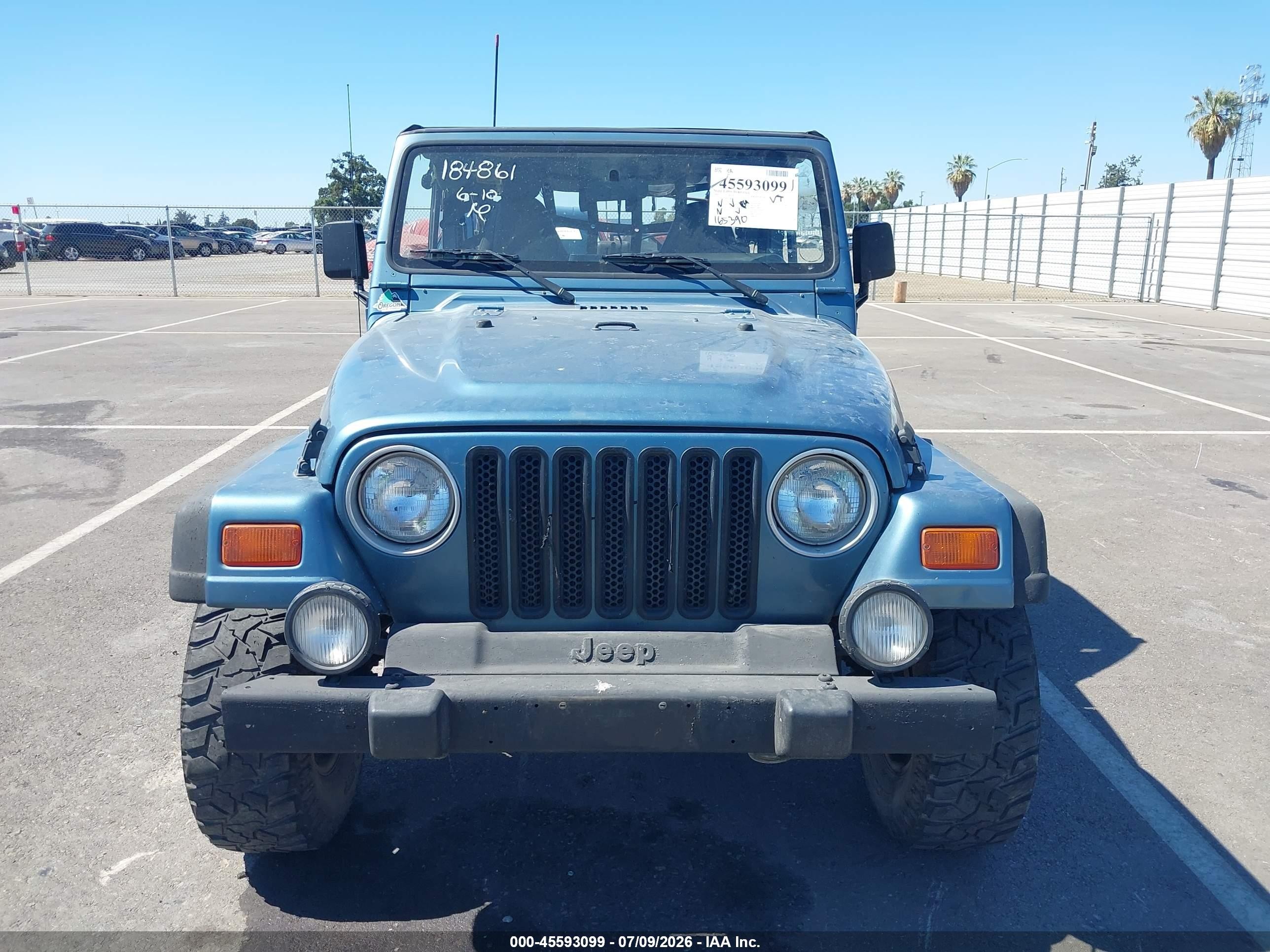 1999 Jeep Wrangler Sport Blue vin: 1J4FY19S2XP408671