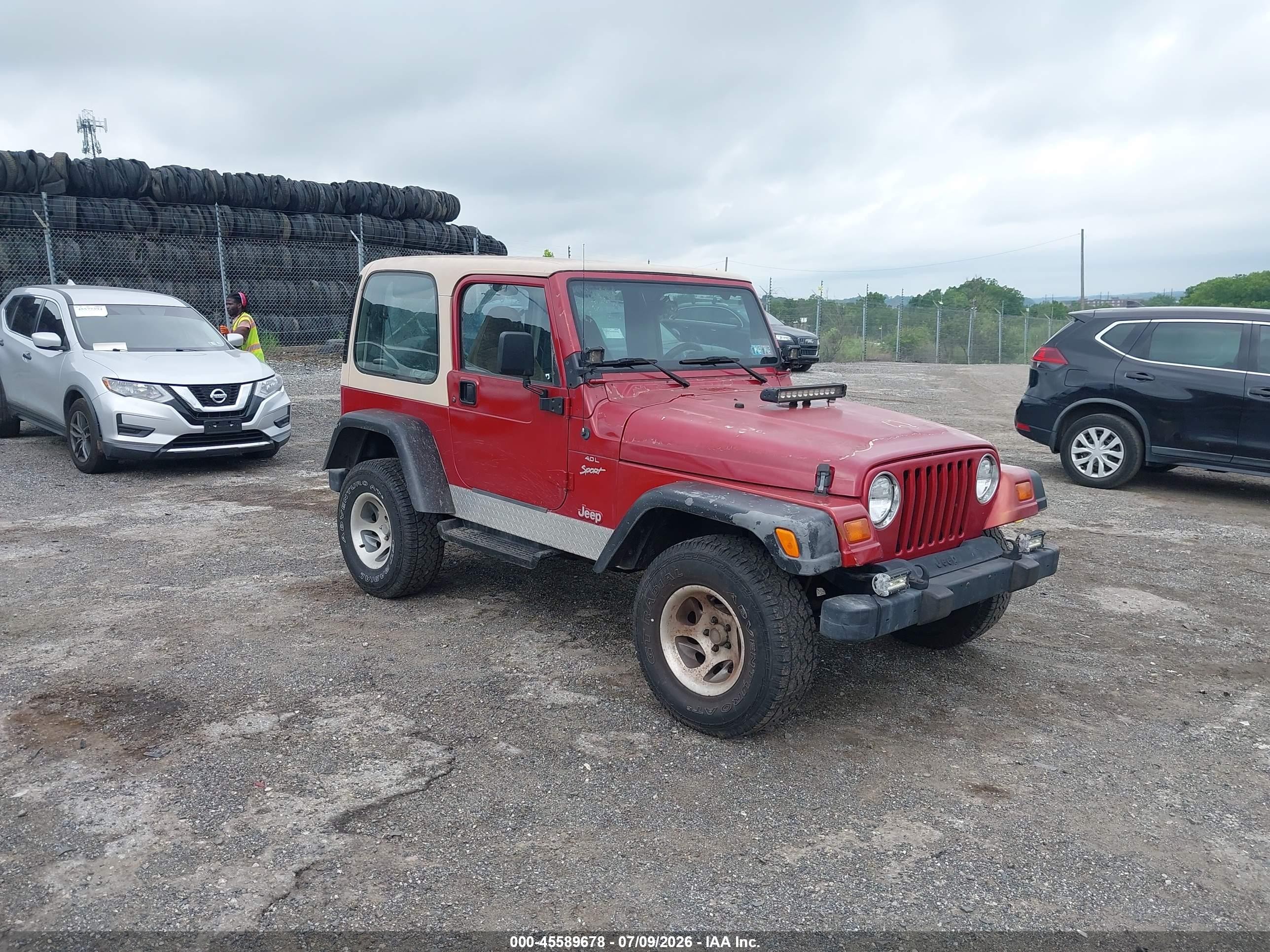 1999 Jeep Wrangler Sport Red vin: 1J4FY19S3XP426273