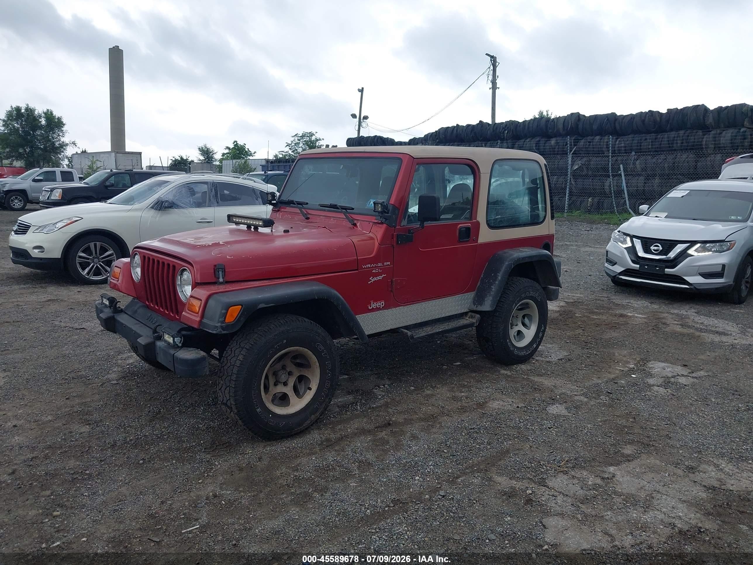 1999 Jeep Wrangler Sport Red vin: 1J4FY19S3XP426273