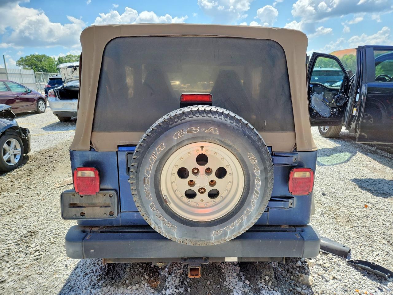 1997 Jeep Wrangler / Tj Sport Blue vin: 1J4FY19S4VP433990