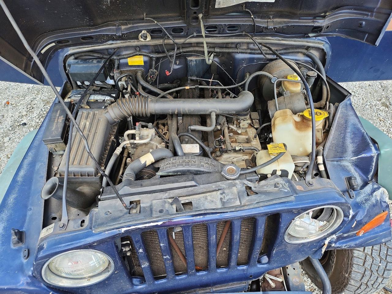 1997 Jeep Wrangler / Tj Sport Blue vin: 1J4FY19S4VP433990