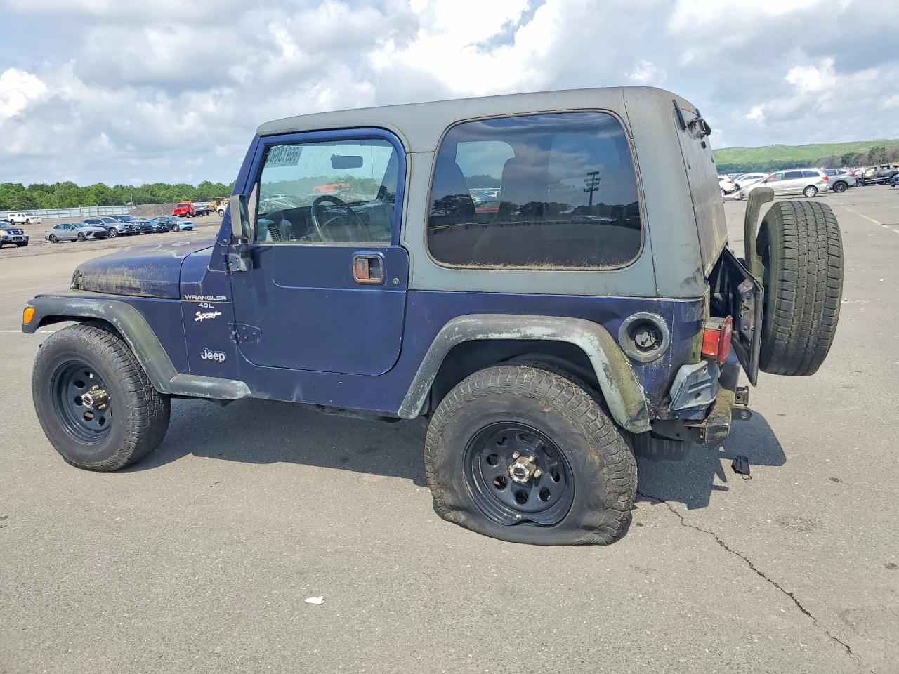 1997 Jeep Wrangler / Tj Sport Blue vin: 1J4FY19S4VP538741