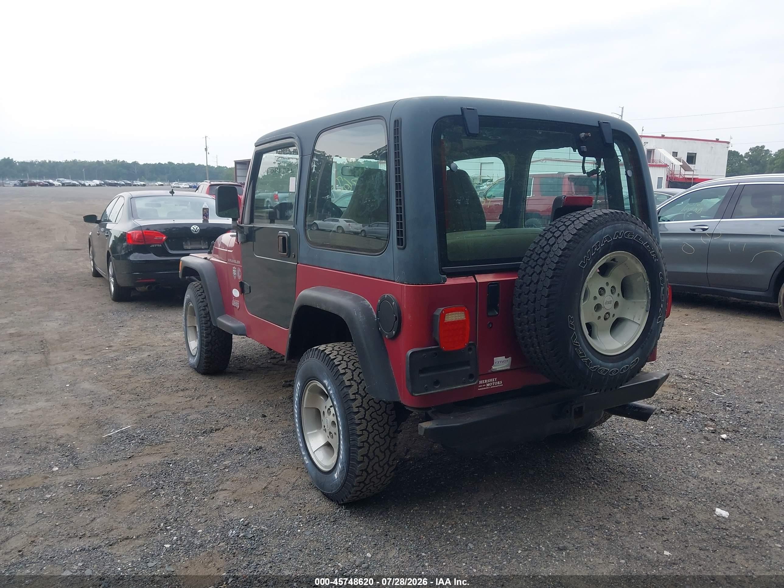 1999 Jeep Wrangler Sport Red vin: 1J4FY19S7XP454786