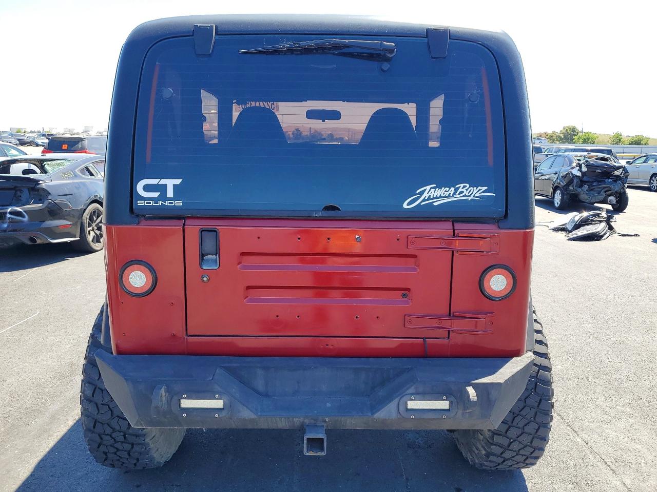 1999 Jeep Wrangler / Tj Sport Orange vin: 1J4FY19S7XP491613