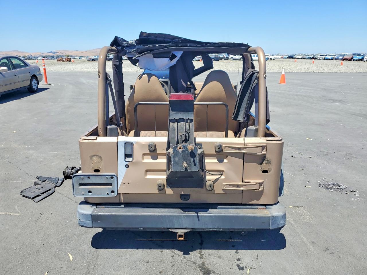 1999 Jeep Wrangler / Tj Sport Gold vin: 1J4FY19S9XP409560
