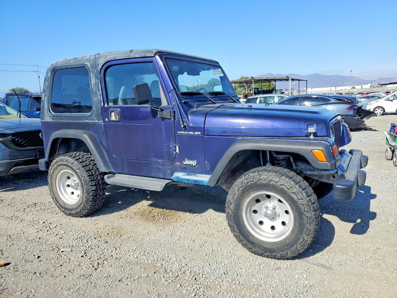 1999 Jeep Wrangler Blue vin: 1J4FY29P2XP472503
