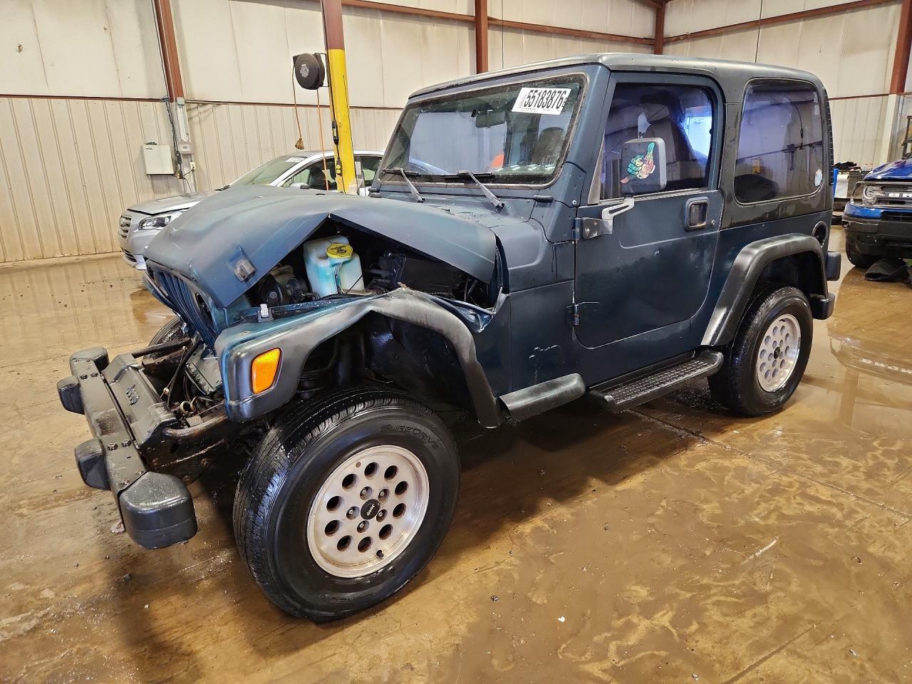 1998 Jeep Wrangler / Tj Se Black vin: 1J4FY29P8WP706593