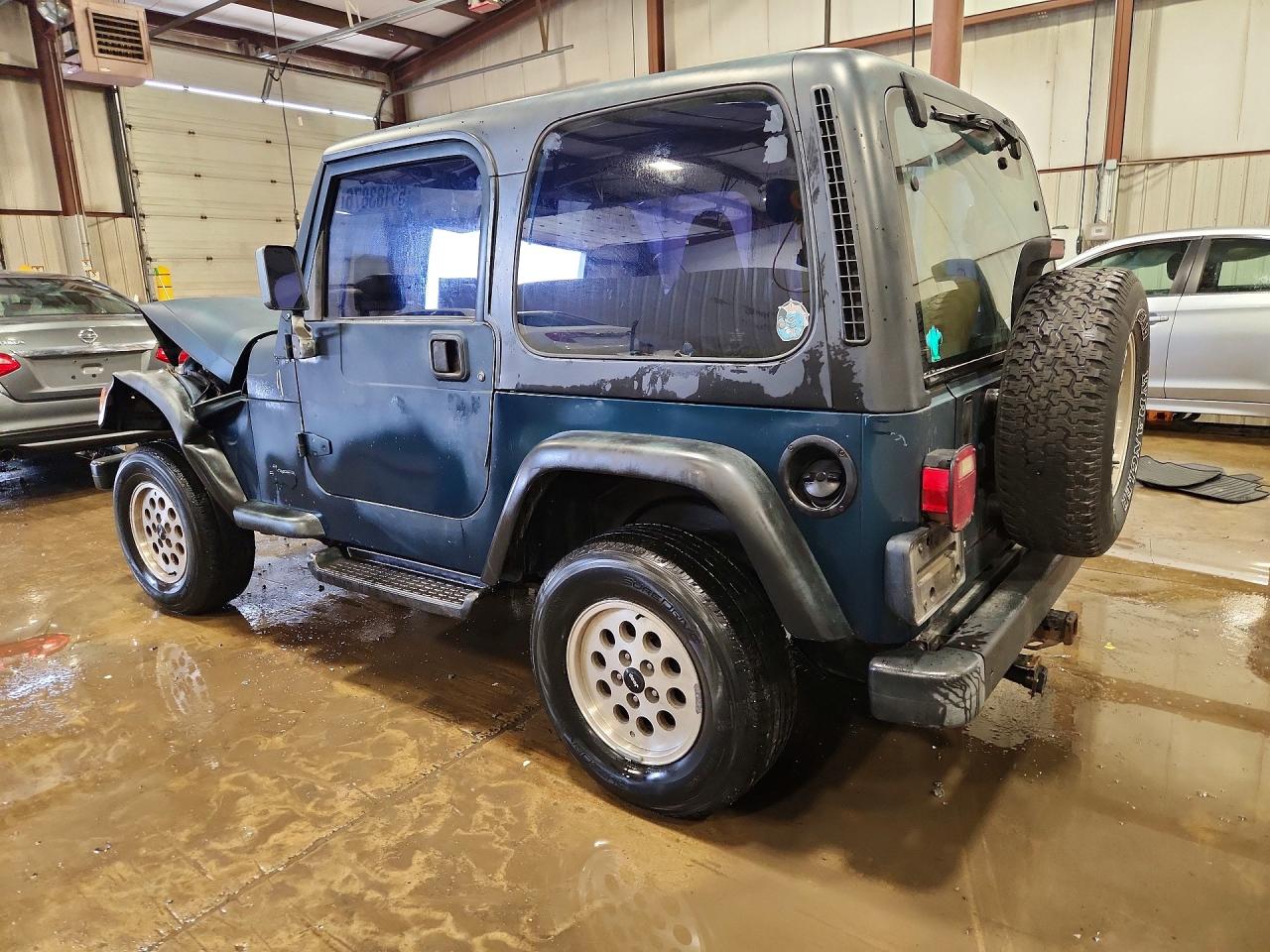 1998 Jeep Wrangler / Tj Se Black vin: 1J4FY29P8WP706593