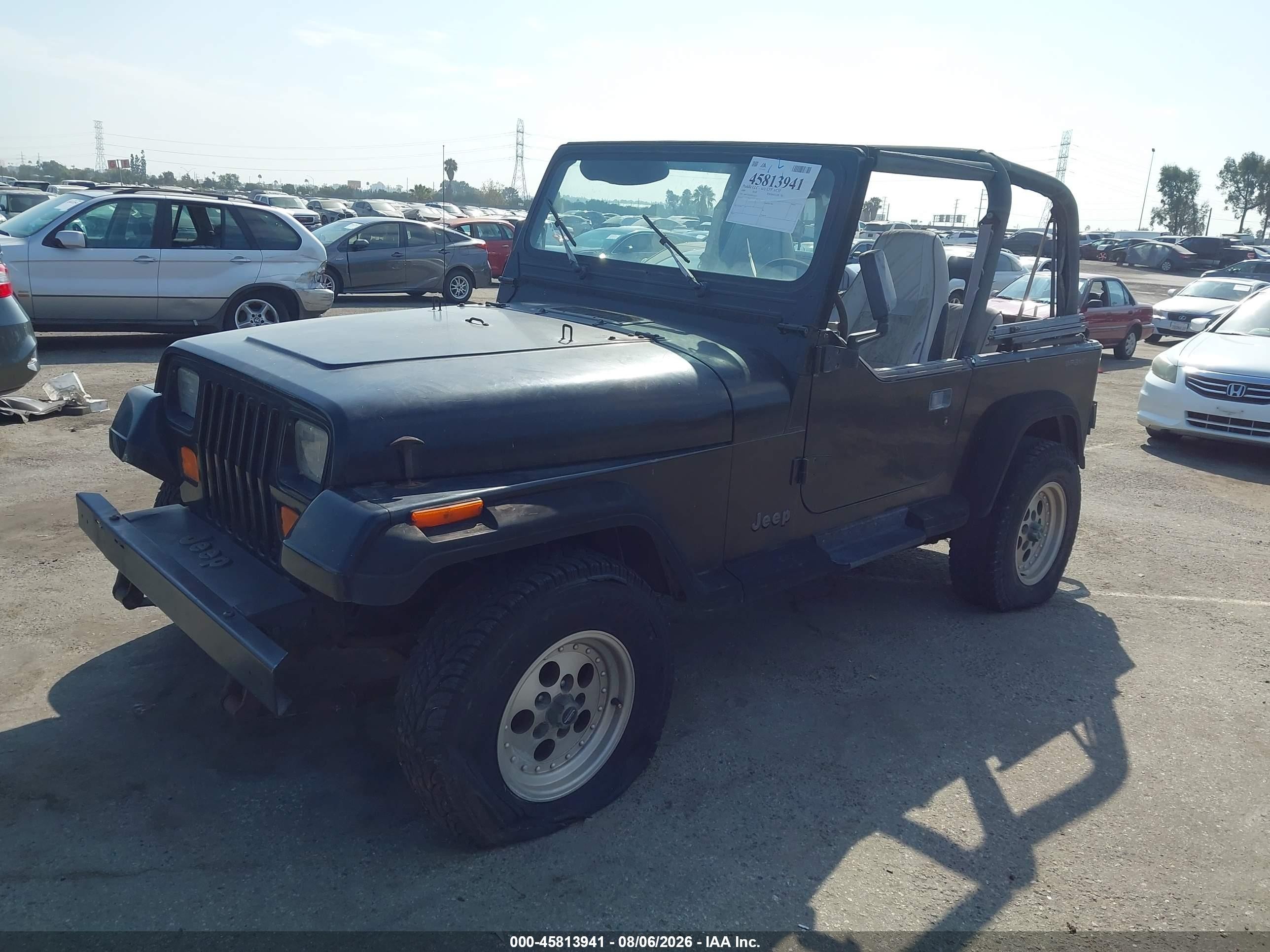 1994 Jeep Wrangler / Yj Se Black vin: 1J4FY29S2RP425673