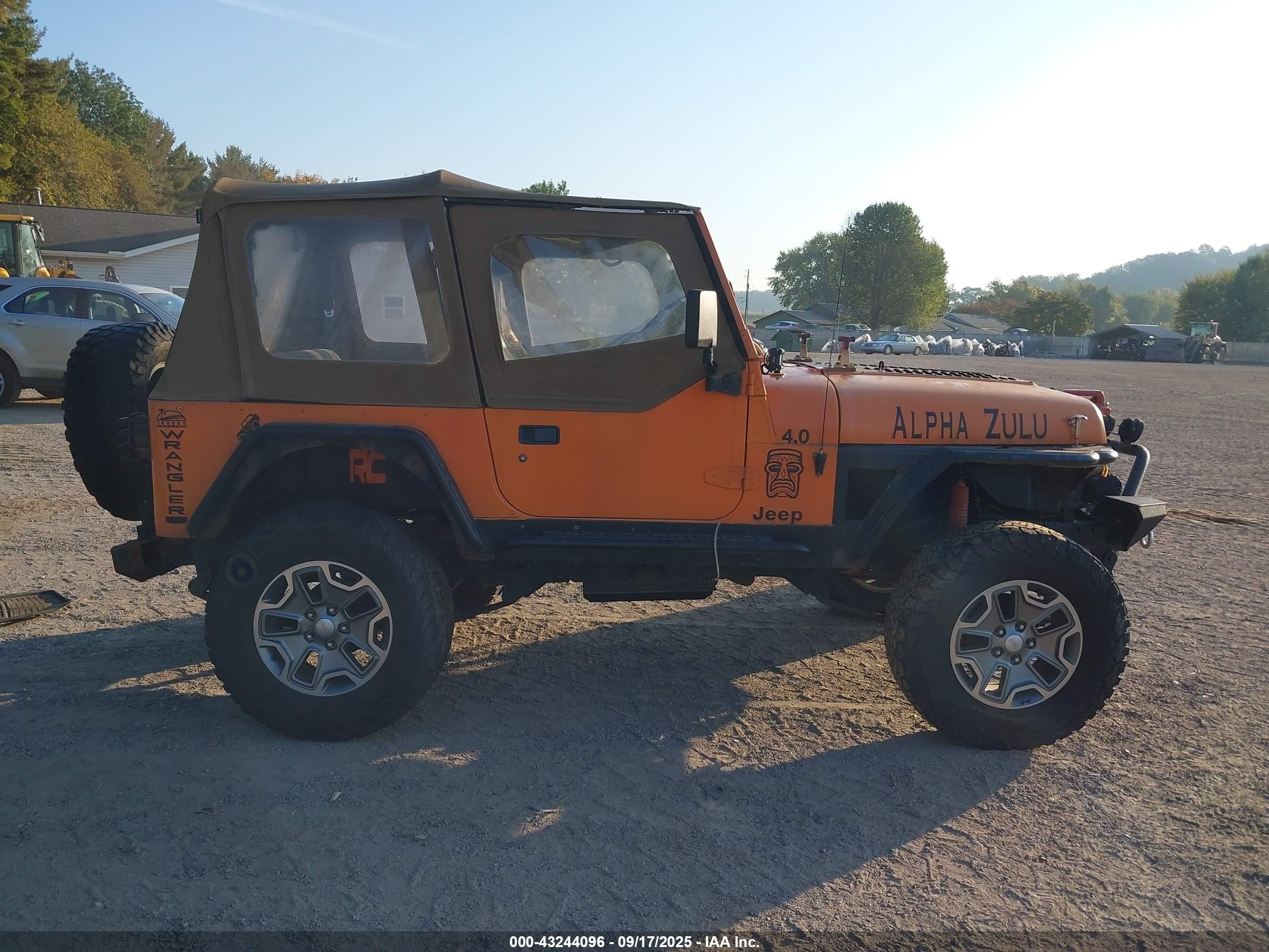 1993 Jeep Wrangler / Yj Sahara Оранжевый vin: 1J4FY49S2PP262662