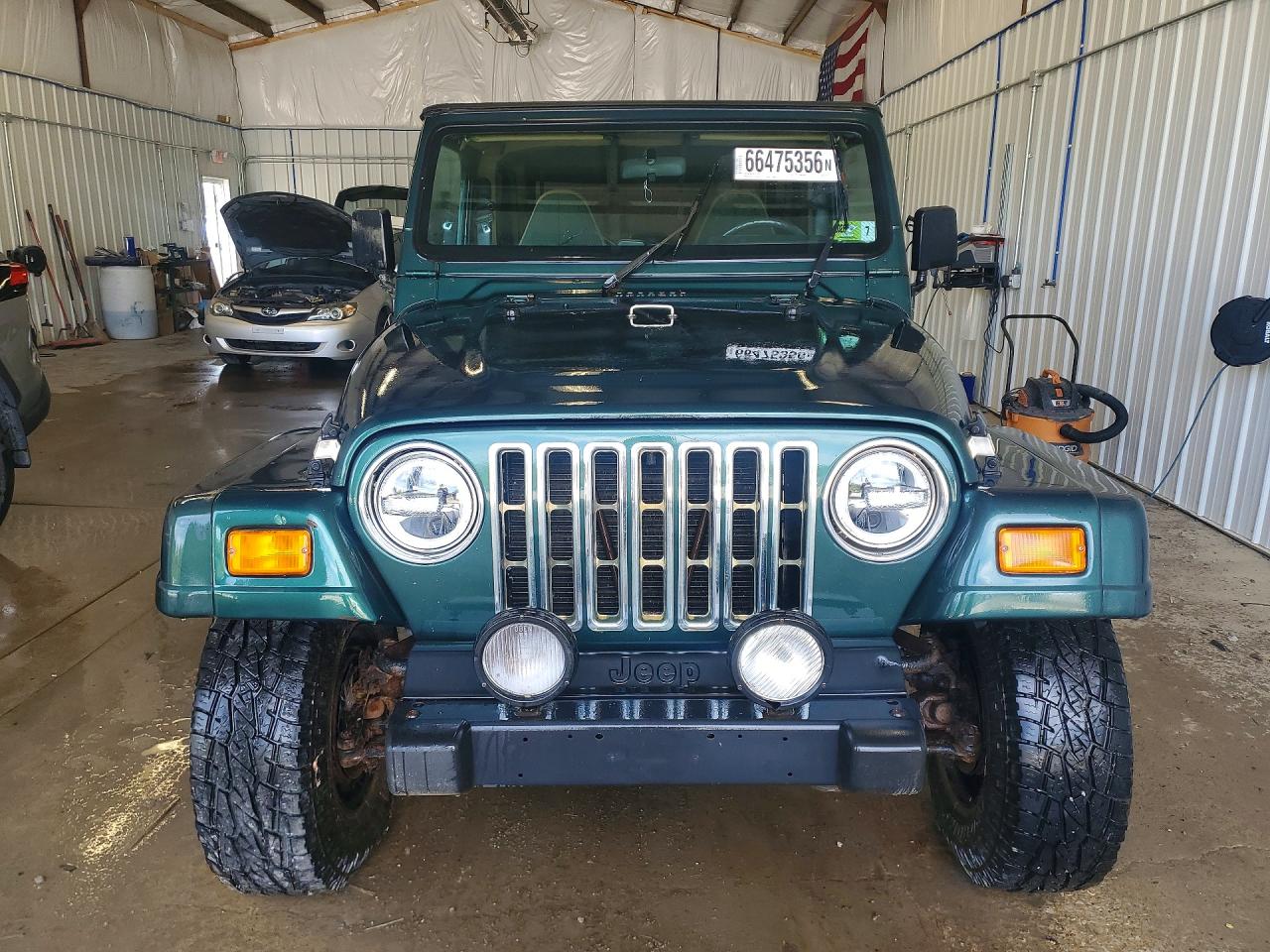 1999 Jeep Wrangler / Tj Sahara Зеленый vin: 1J4FY49S2XP470153