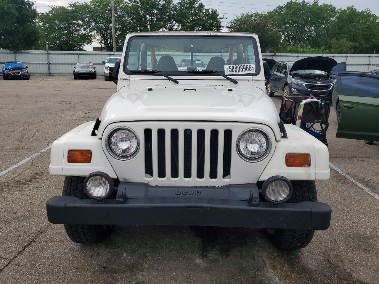 1997 Jeep Wrangler / Tj Sahara White vin: 1J4FY49S7VP520381