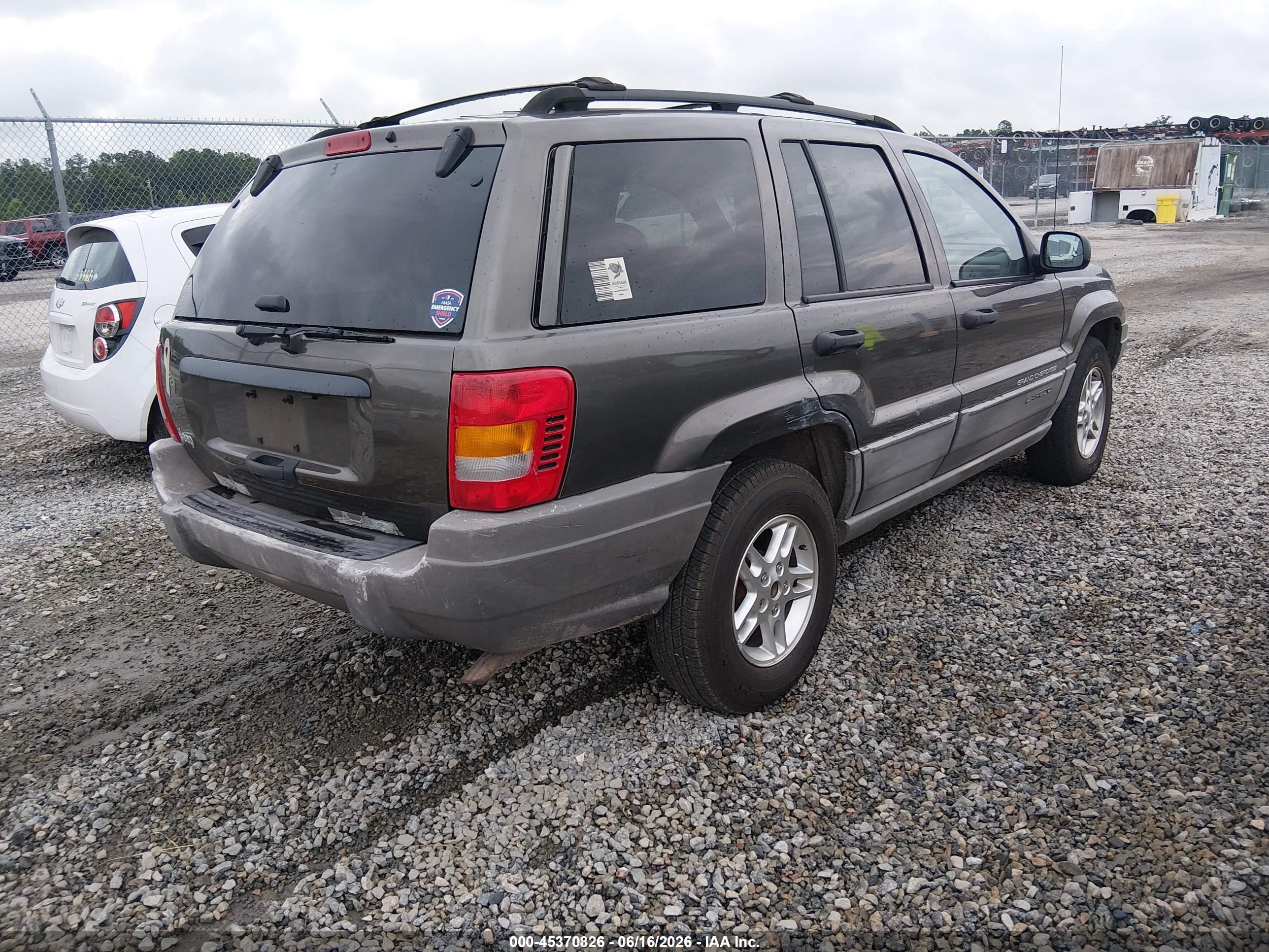 1999 Jeep Grand Cherokee Laredo Коричневый vin: 1J4G258S3XC526105