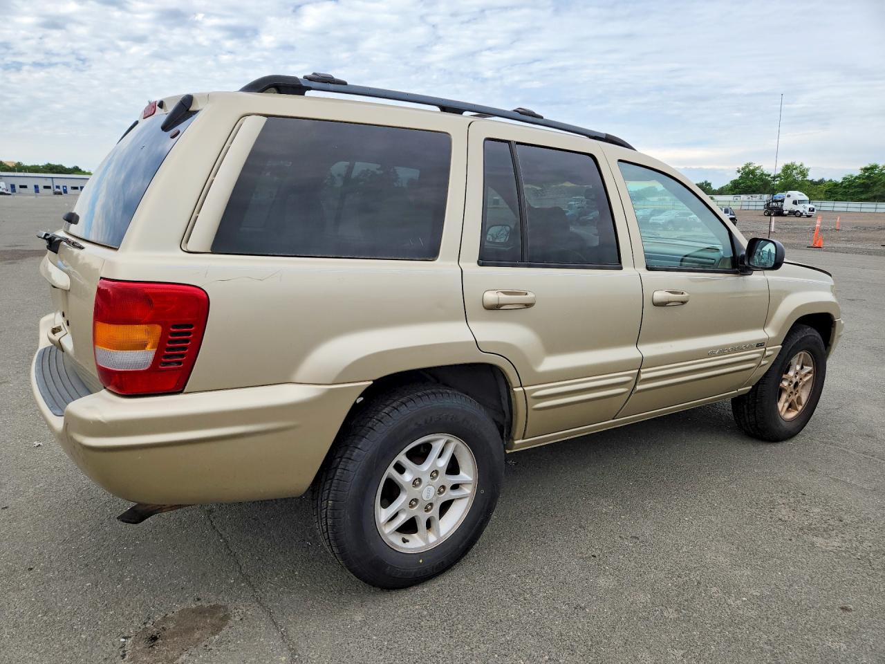 2000 Jeep Grand Cherokee Limited Золотой vin: 1J4G258S4YC367600
