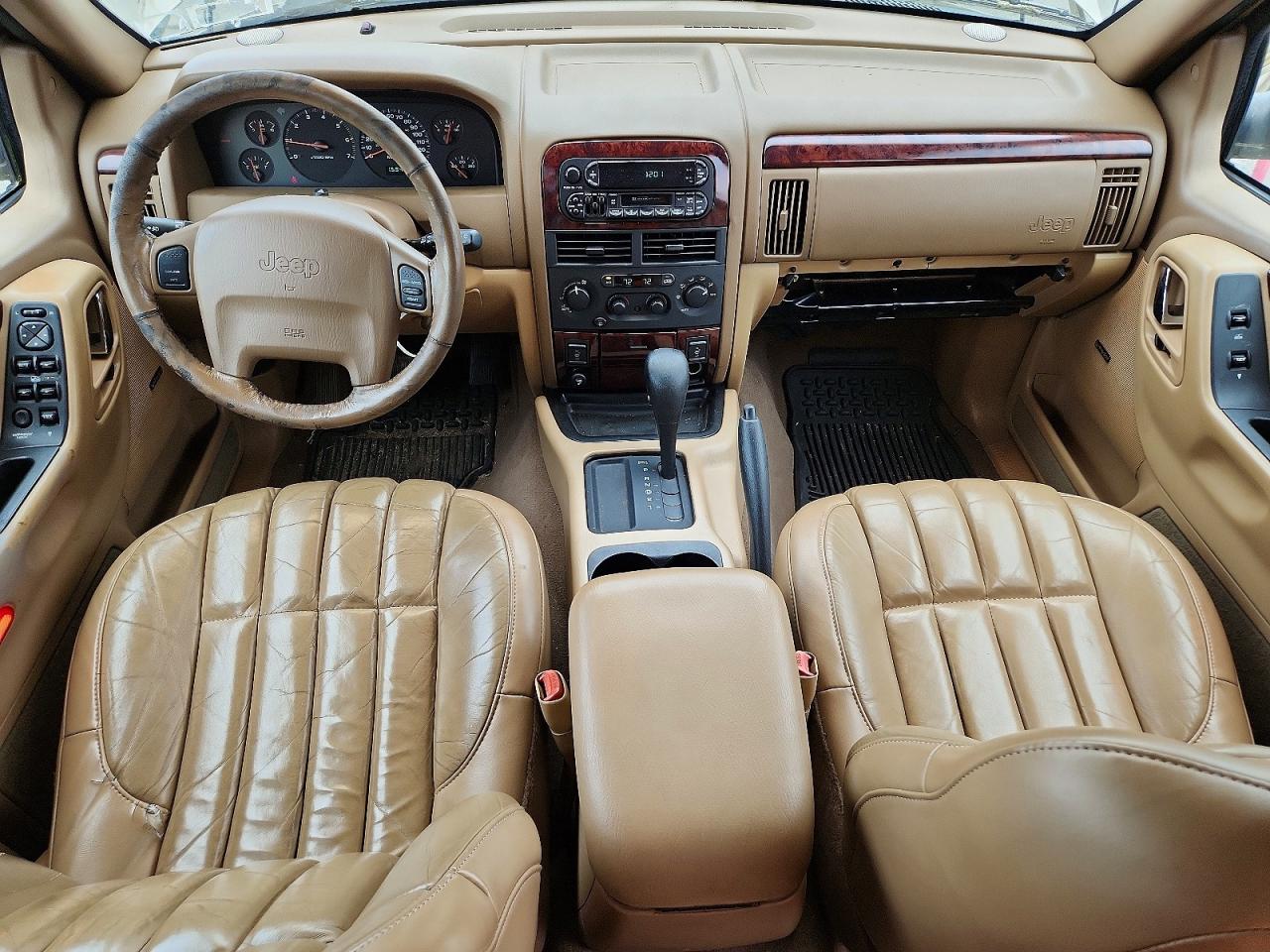 2000 Jeep Grand Cherokee Limited Золотой vin: 1J4G258S4YC367600