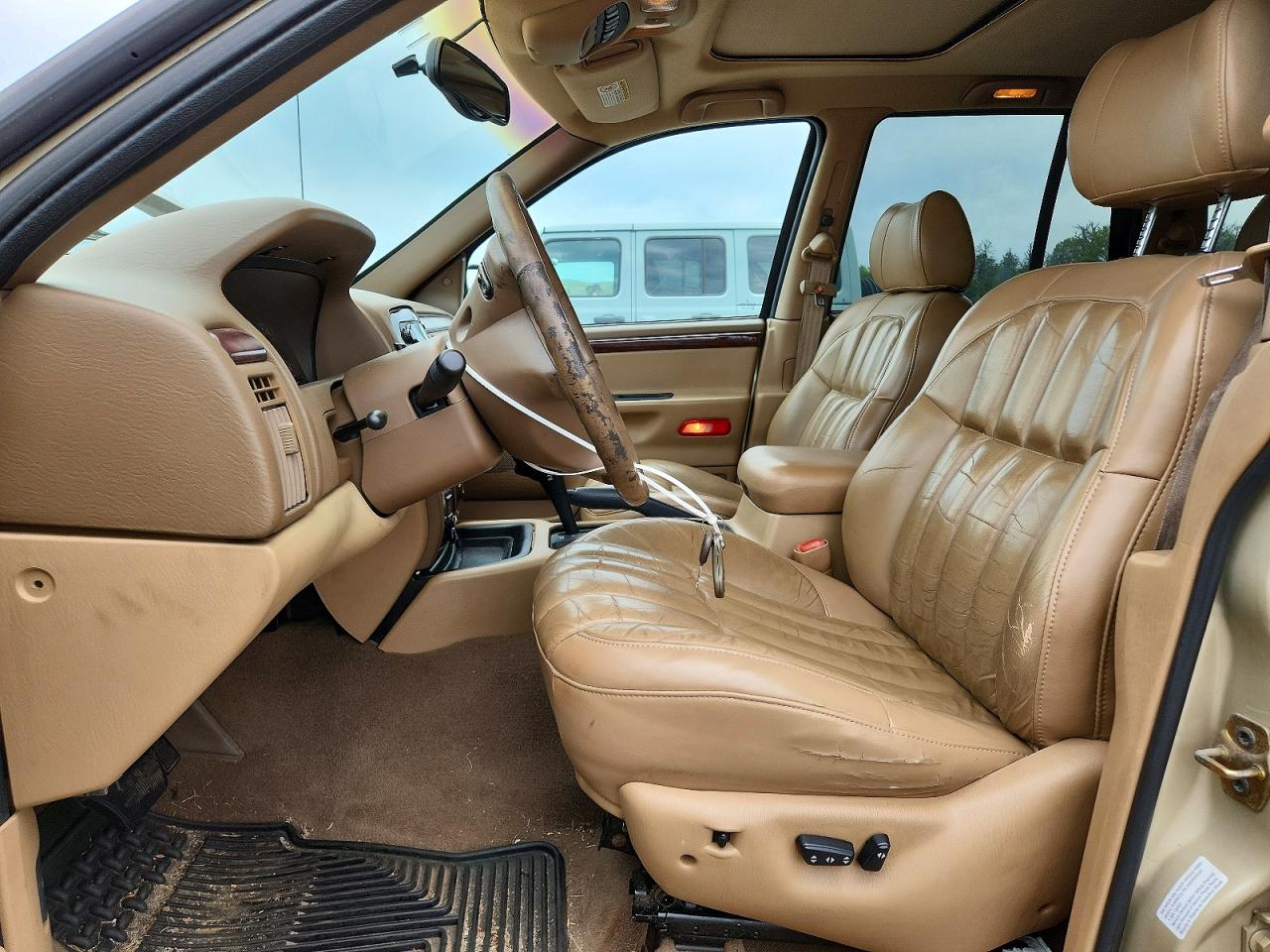 2000 Jeep Grand Cherokee Limited Золотой vin: 1J4G258S4YC367600