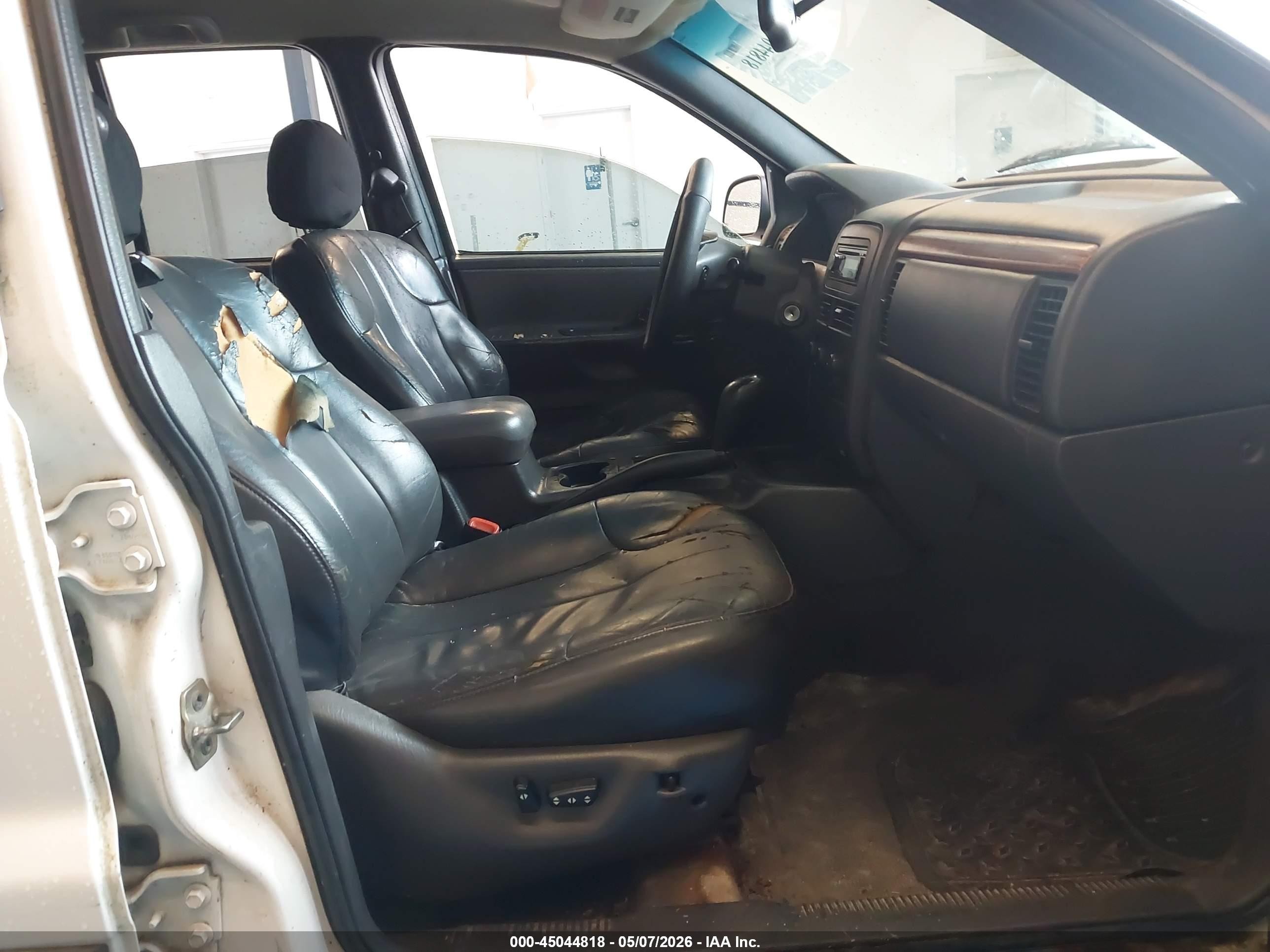 1999 Jeep Grand Cherokee Laredo Белый vin: 1J4G258S7XC518038