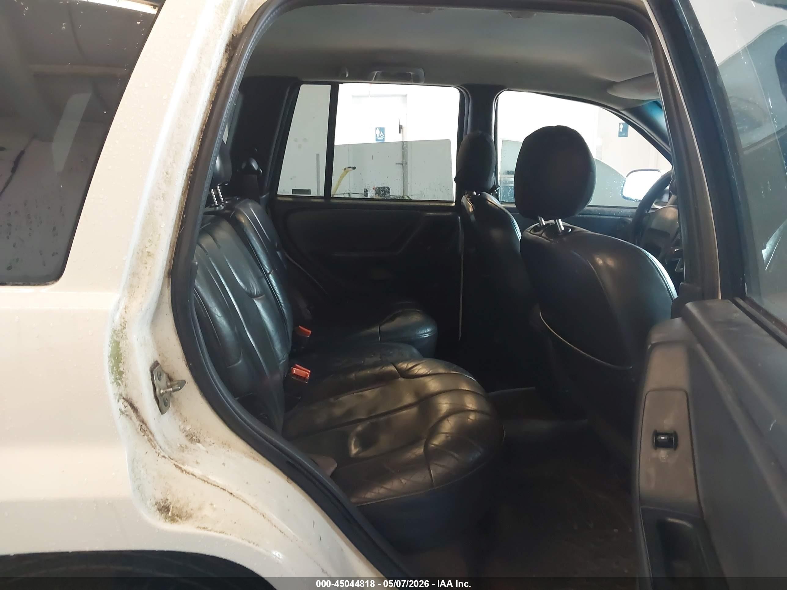1999 Jeep Grand Cherokee Laredo Белый vin: 1J4G258S7XC518038