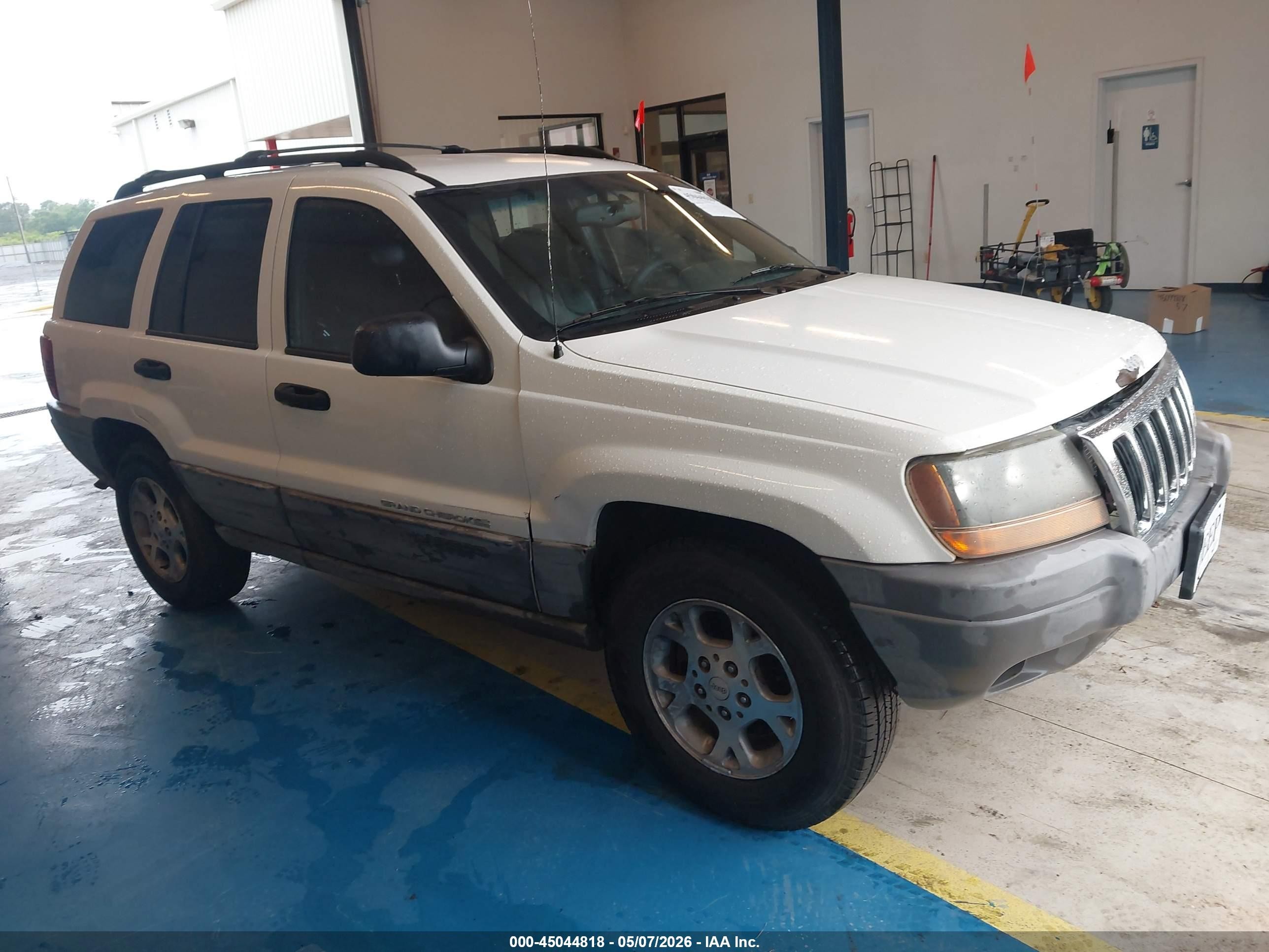 1999 Jeep Grand Cherokee Laredo Белый vin: 1J4G258S7XC518038