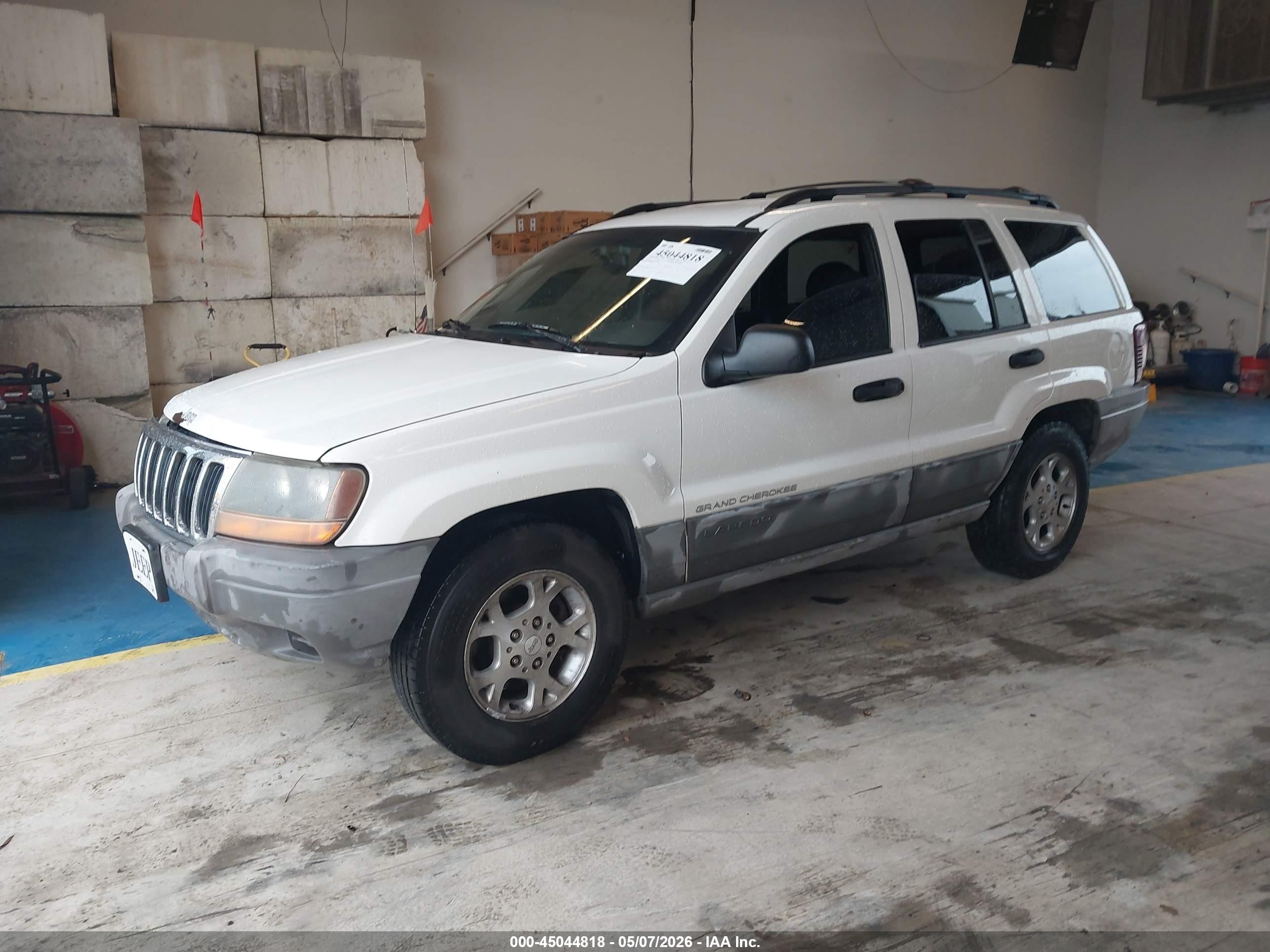 1999 Jeep Grand Cherokee Laredo Белый vin: 1J4G258S7XC518038