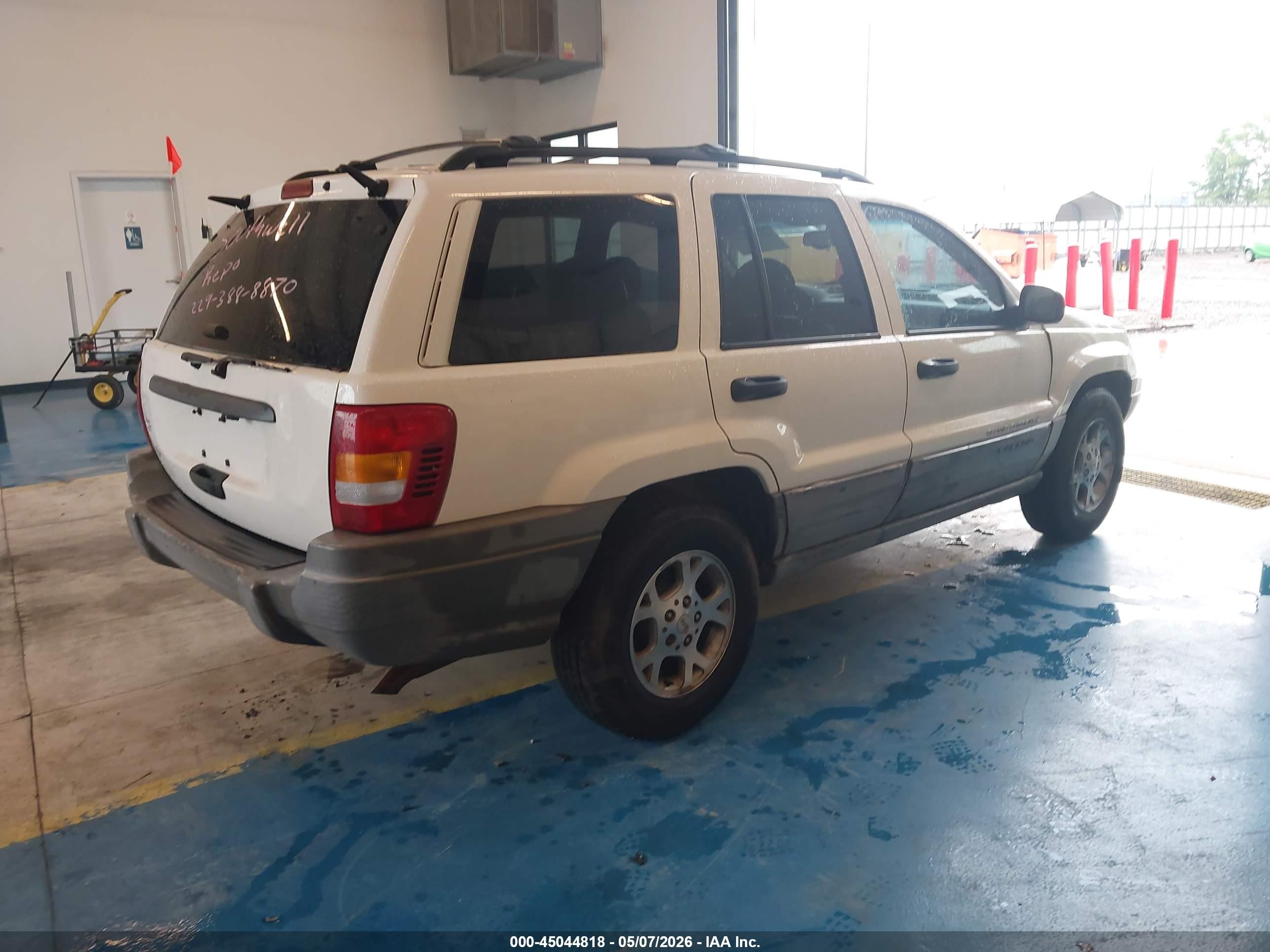 1999 Jeep Grand Cherokee Laredo Белый vin: 1J4G258S7XC518038