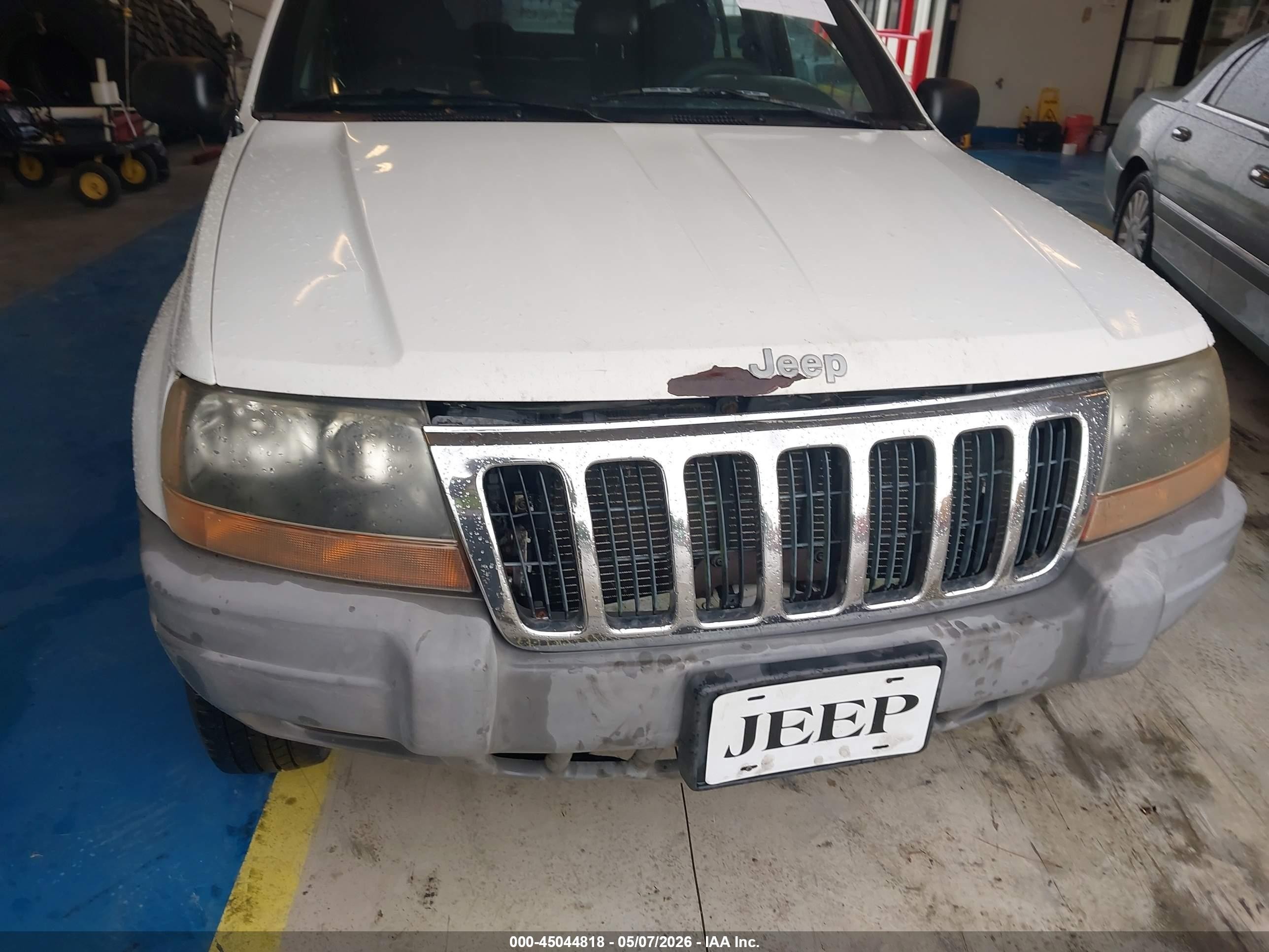 1999 Jeep Grand Cherokee Laredo Белый vin: 1J4G258S7XC518038