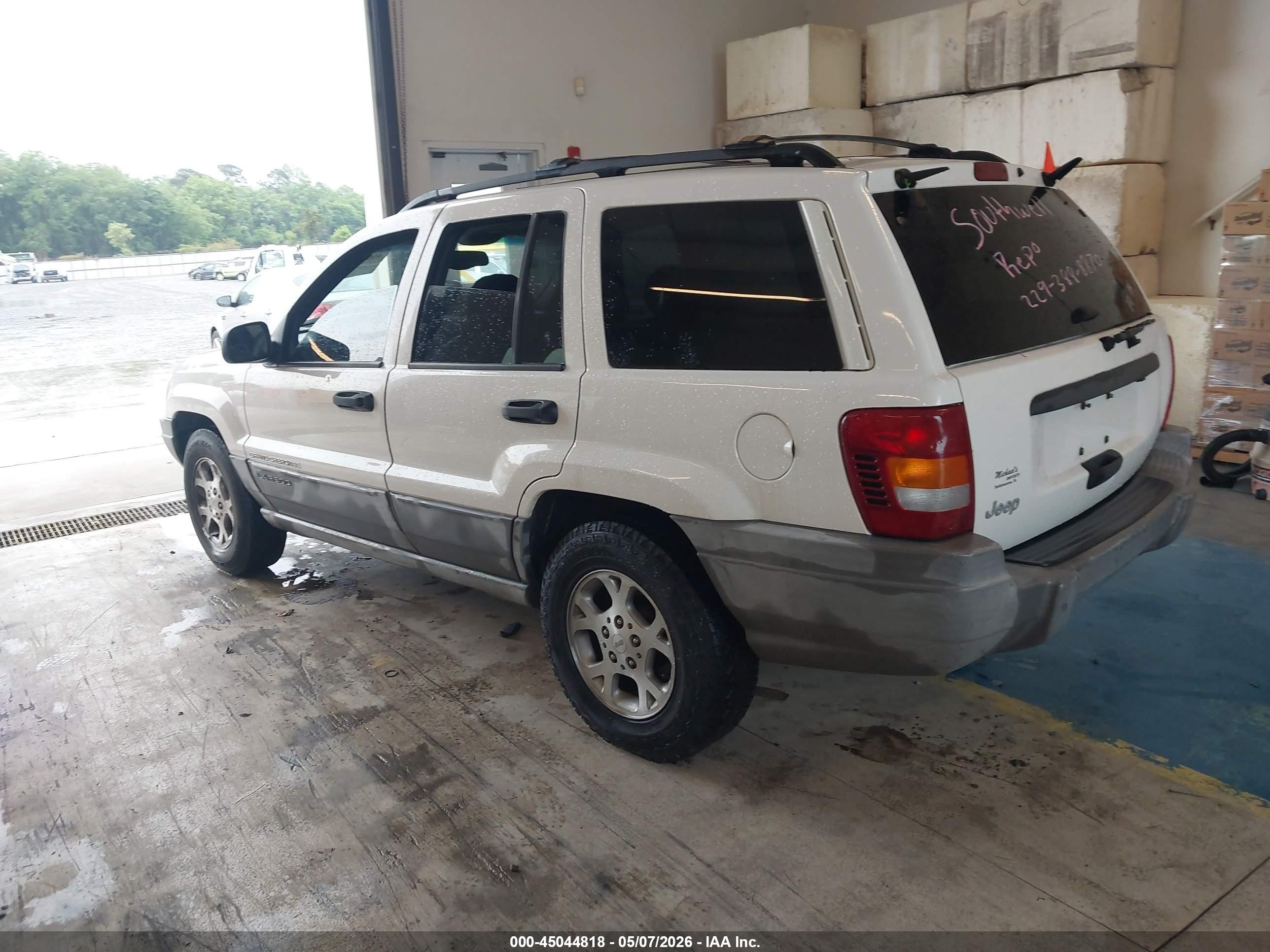 1999 Jeep Grand Cherokee Laredo Белый vin: 1J4G258S7XC518038