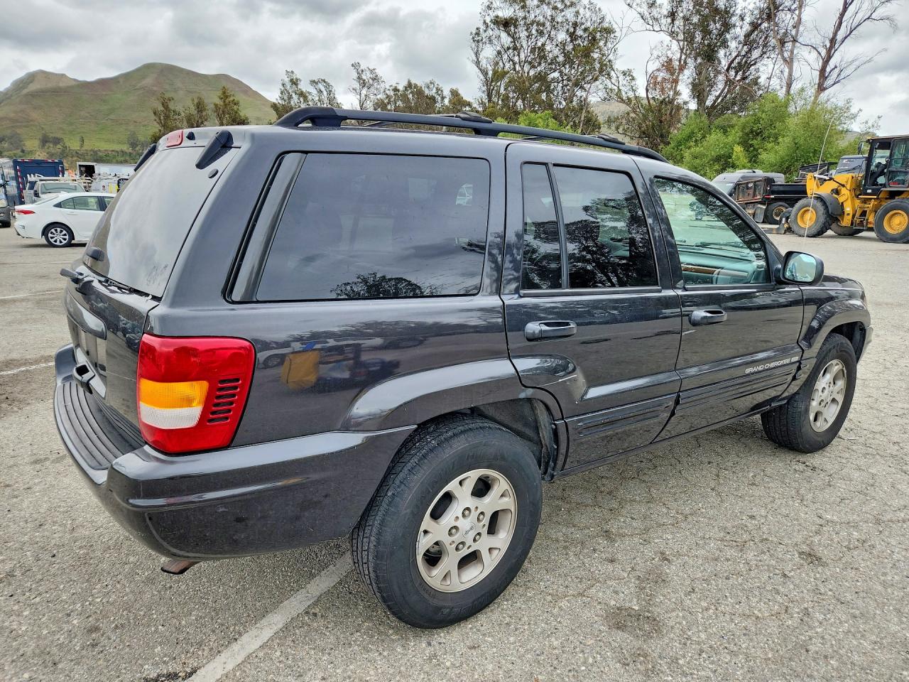 1999 Jeep Grand Cherokee Limited Black vin: 1J4G268S3XC537241