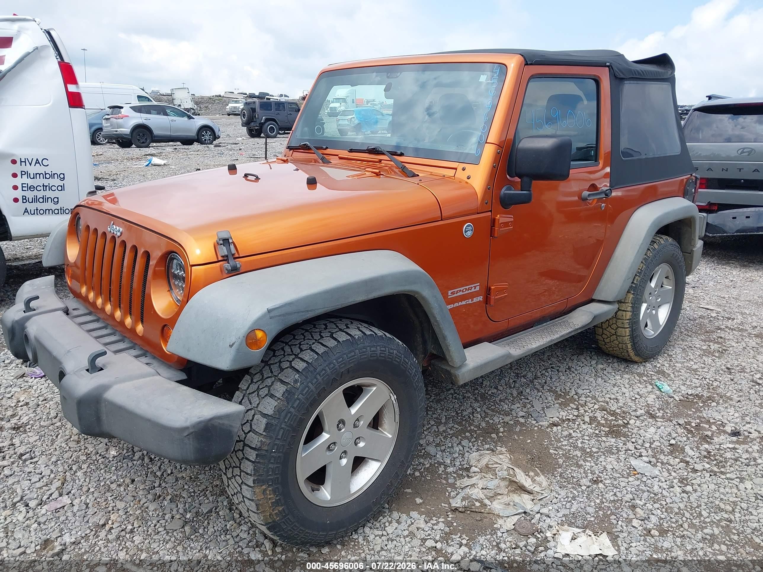2011 Jeep Wrangler Sport Orange vin: 1J4GA2D10BL620255