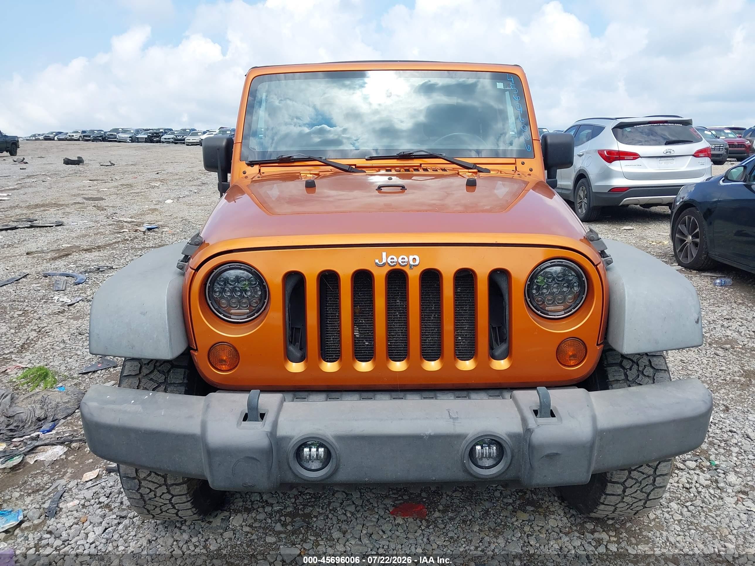 2011 Jeep Wrangler Sport Orange vin: 1J4GA2D10BL620255