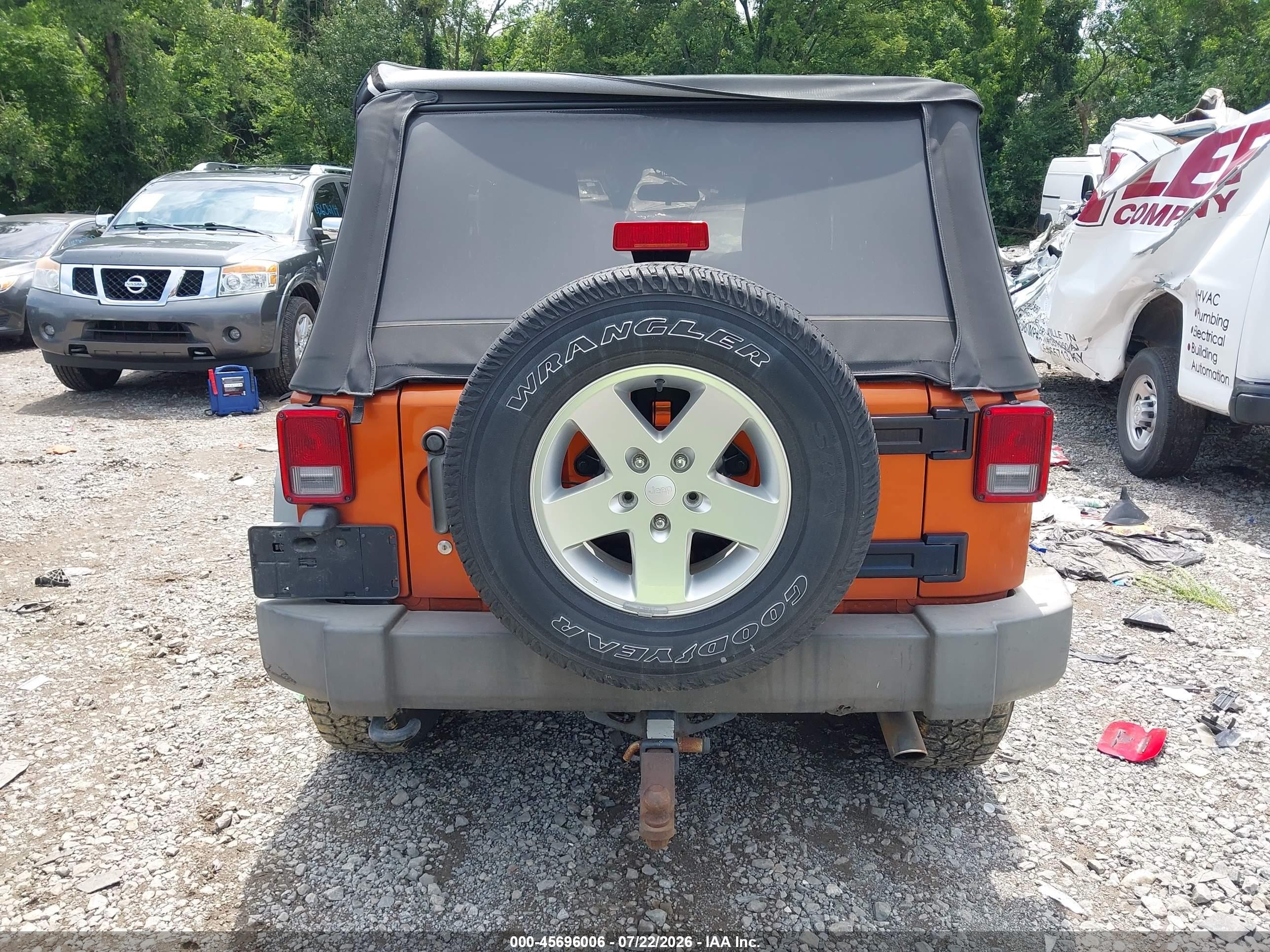 2011 Jeep Wrangler Sport Orange vin: 1J4GA2D10BL620255