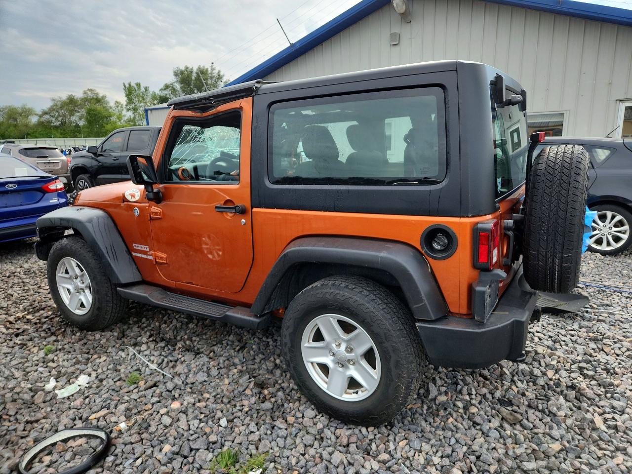 2011 Jeep Wrangler Sport Orange vin: 1J4GA2D10BL625925