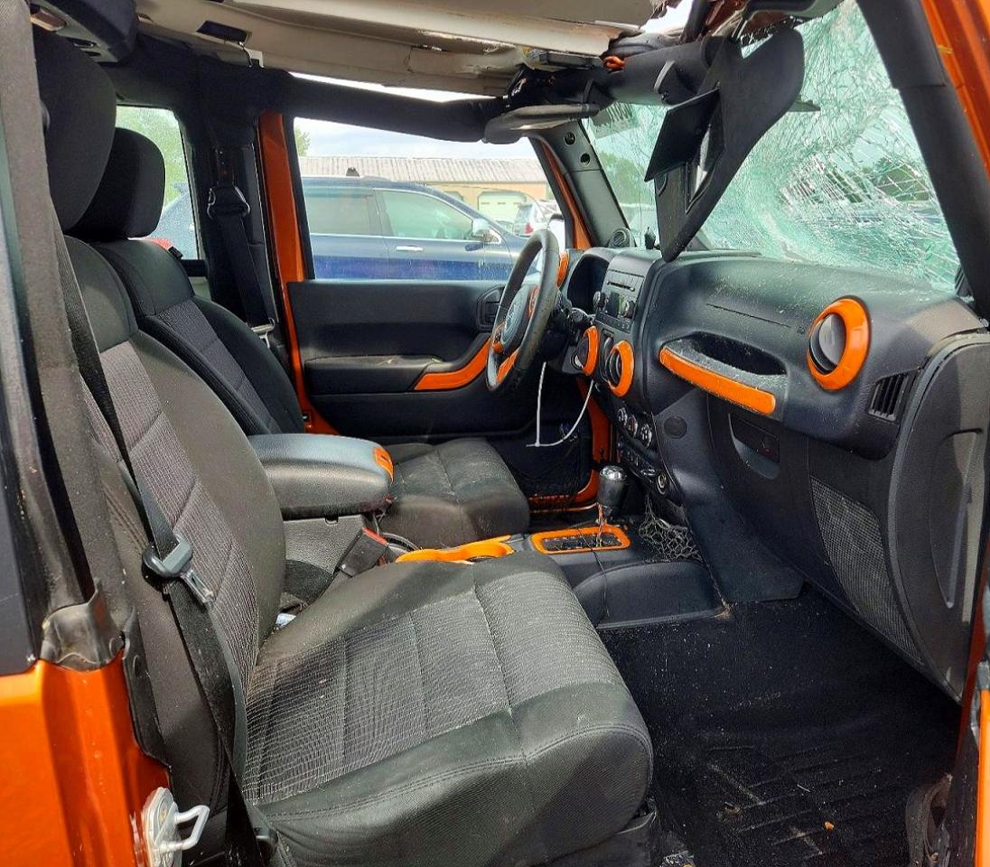 2011 Jeep Wrangler Sport Orange vin: 1J4GA2D10BL625925
