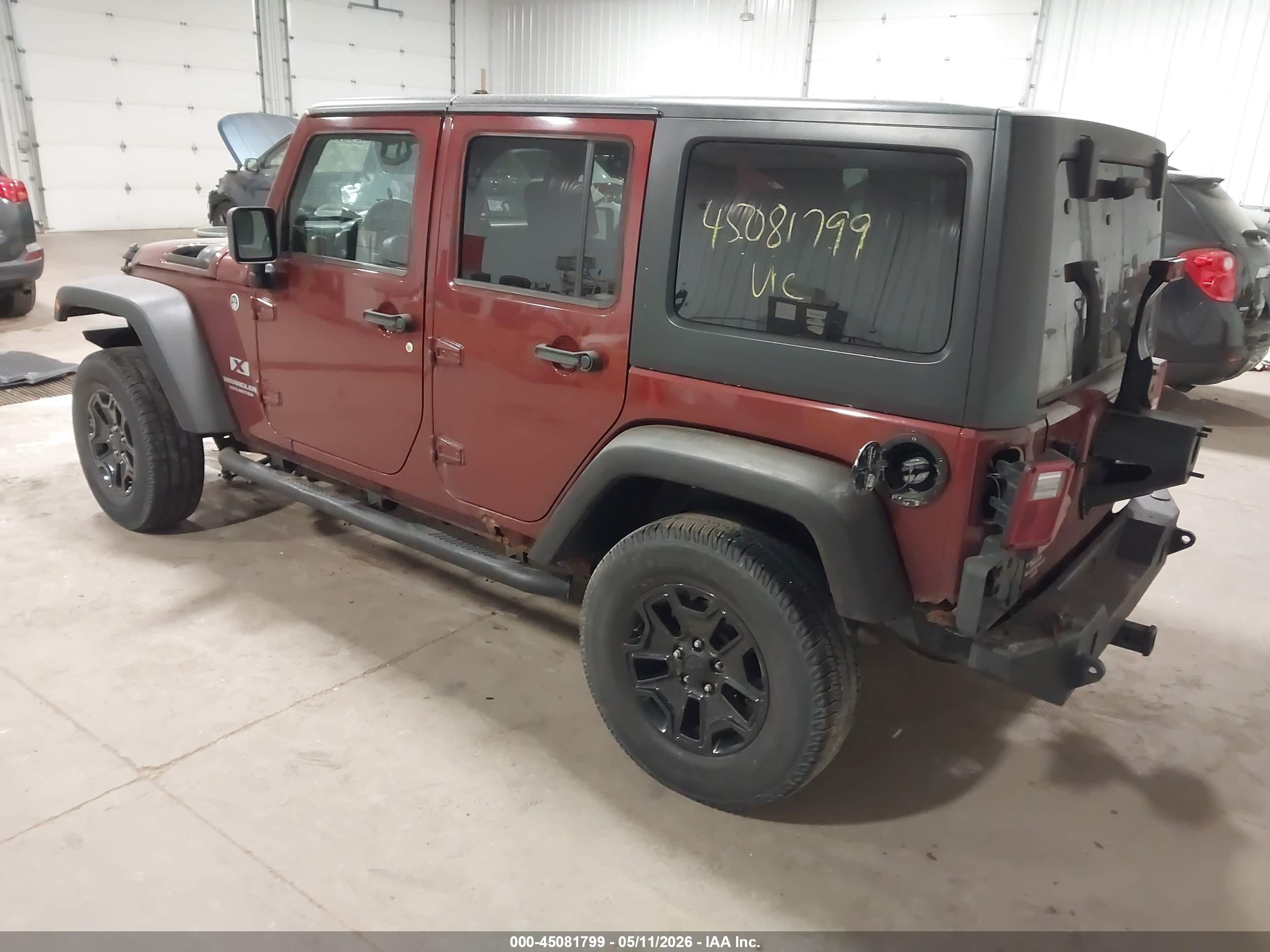 2009 Jeep Wrangler Unlimited X Red vin: 1J4GA39109L784596