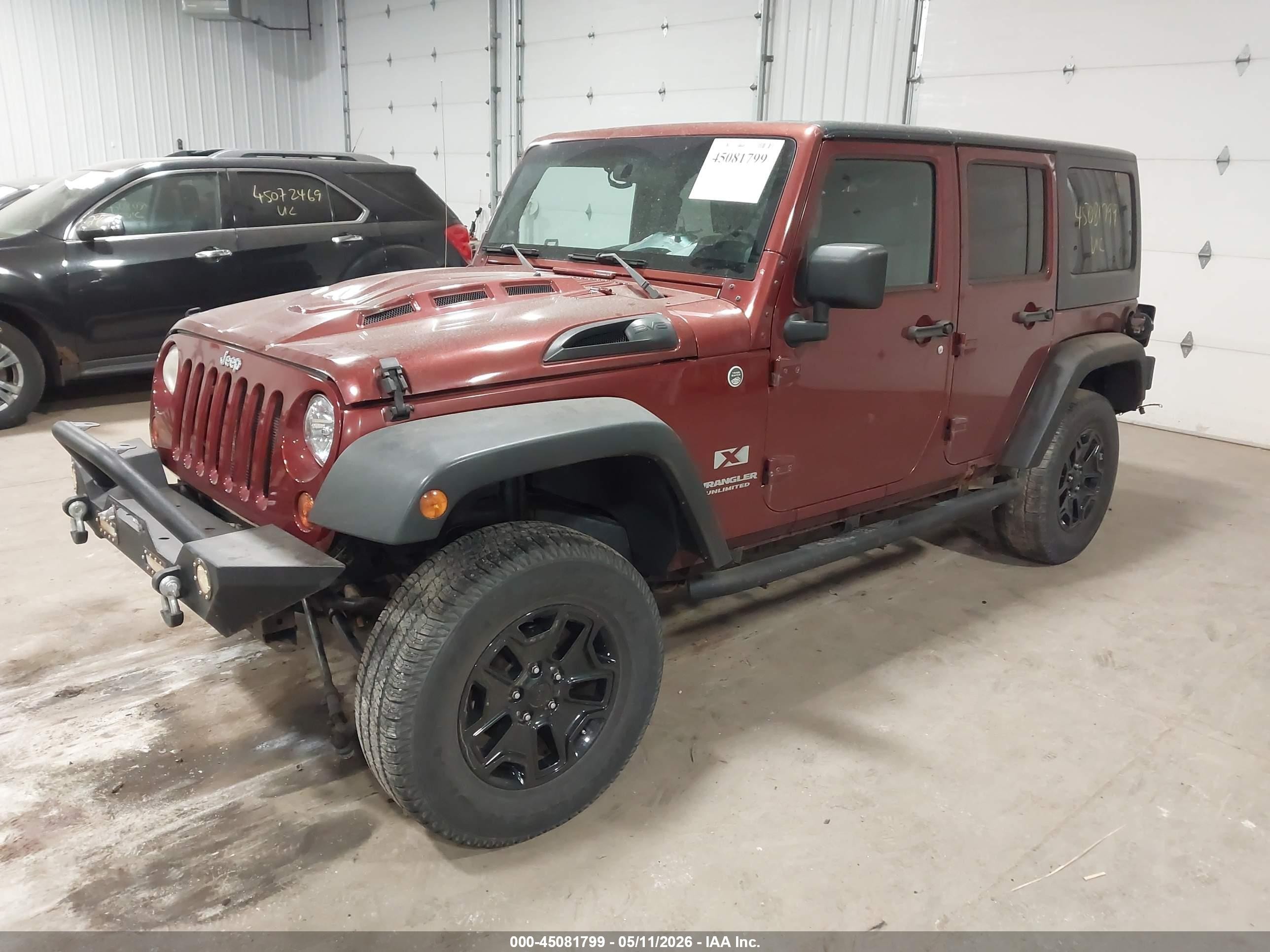 2009 Jeep Wrangler Unlimited X Red vin: 1J4GA39109L784596