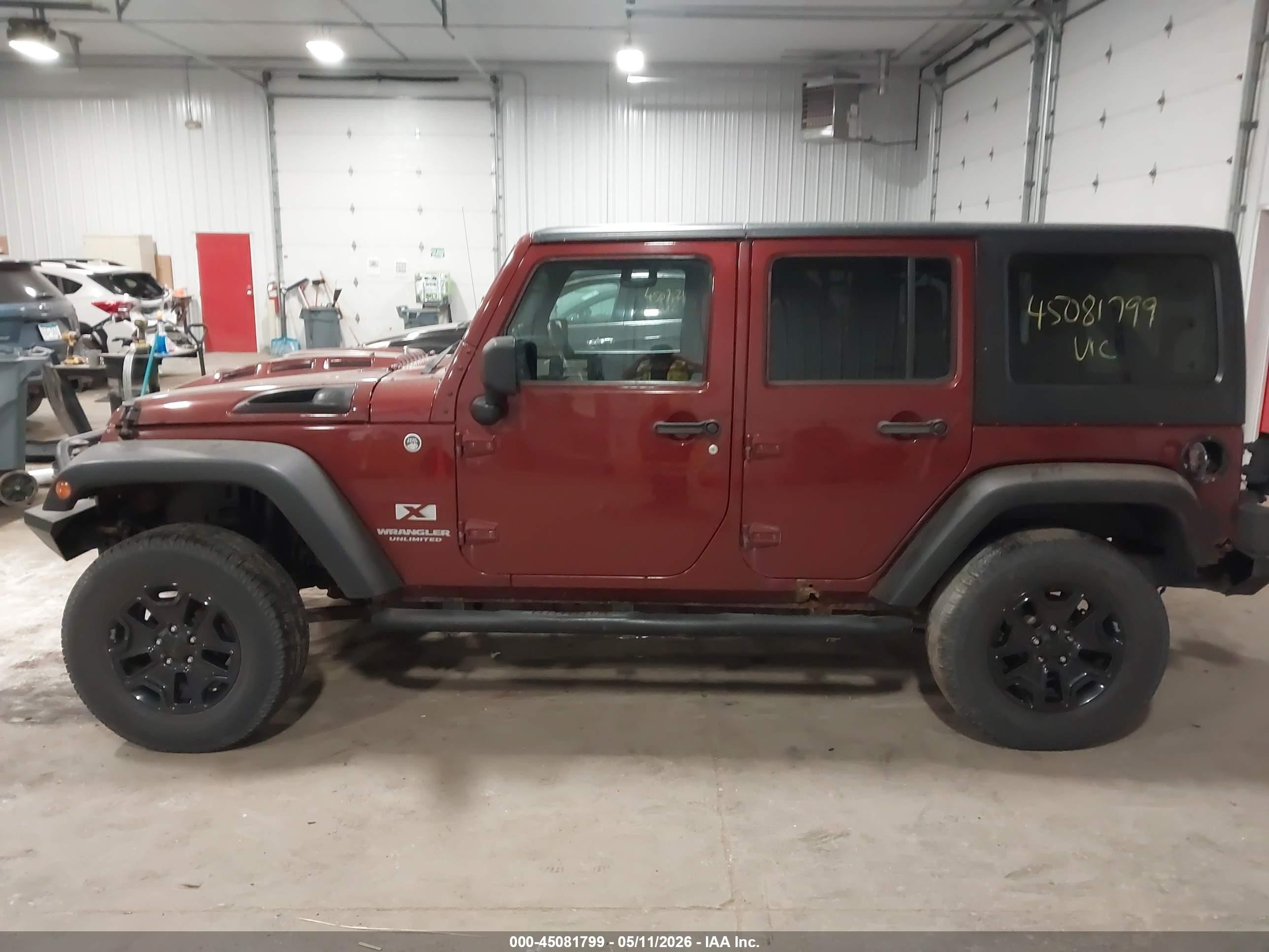 2009 Jeep Wrangler Unlimited X Red vin: 1J4GA39109L784596
