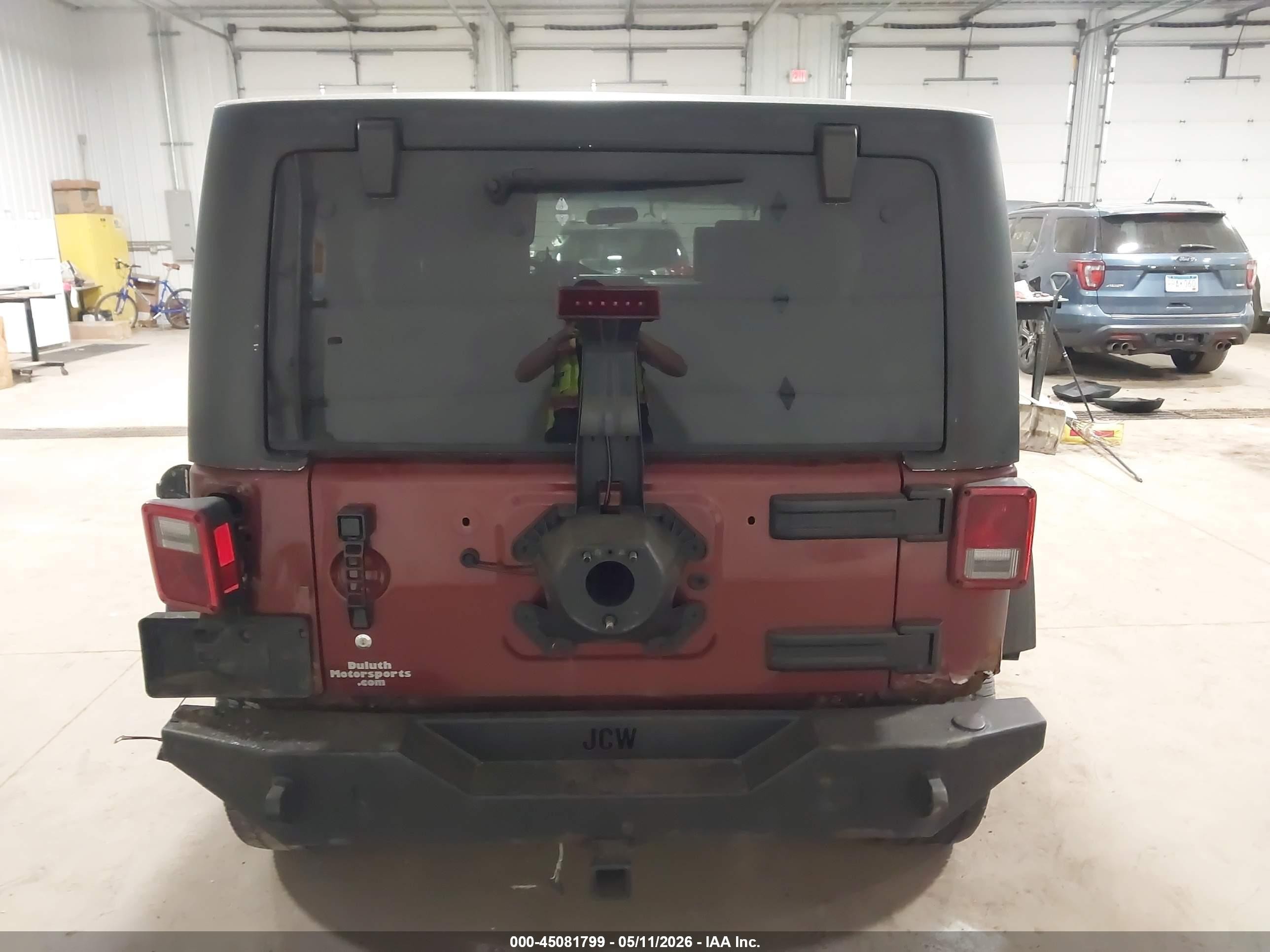 2009 Jeep Wrangler Unlimited X Red vin: 1J4GA39109L784596