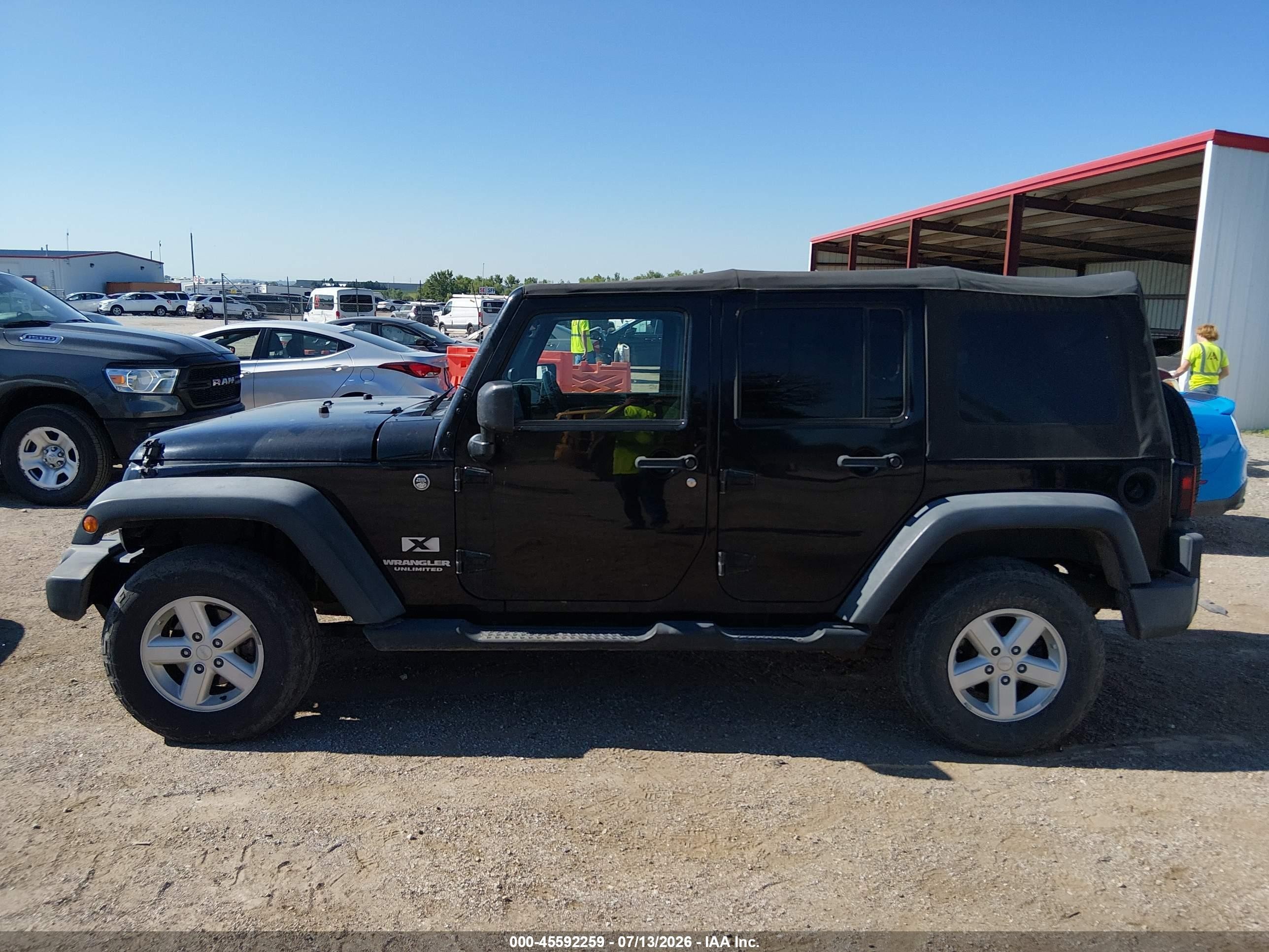 2007 Jeep Wrangler Unlimited X Black vin: 1J4GA39117L133250