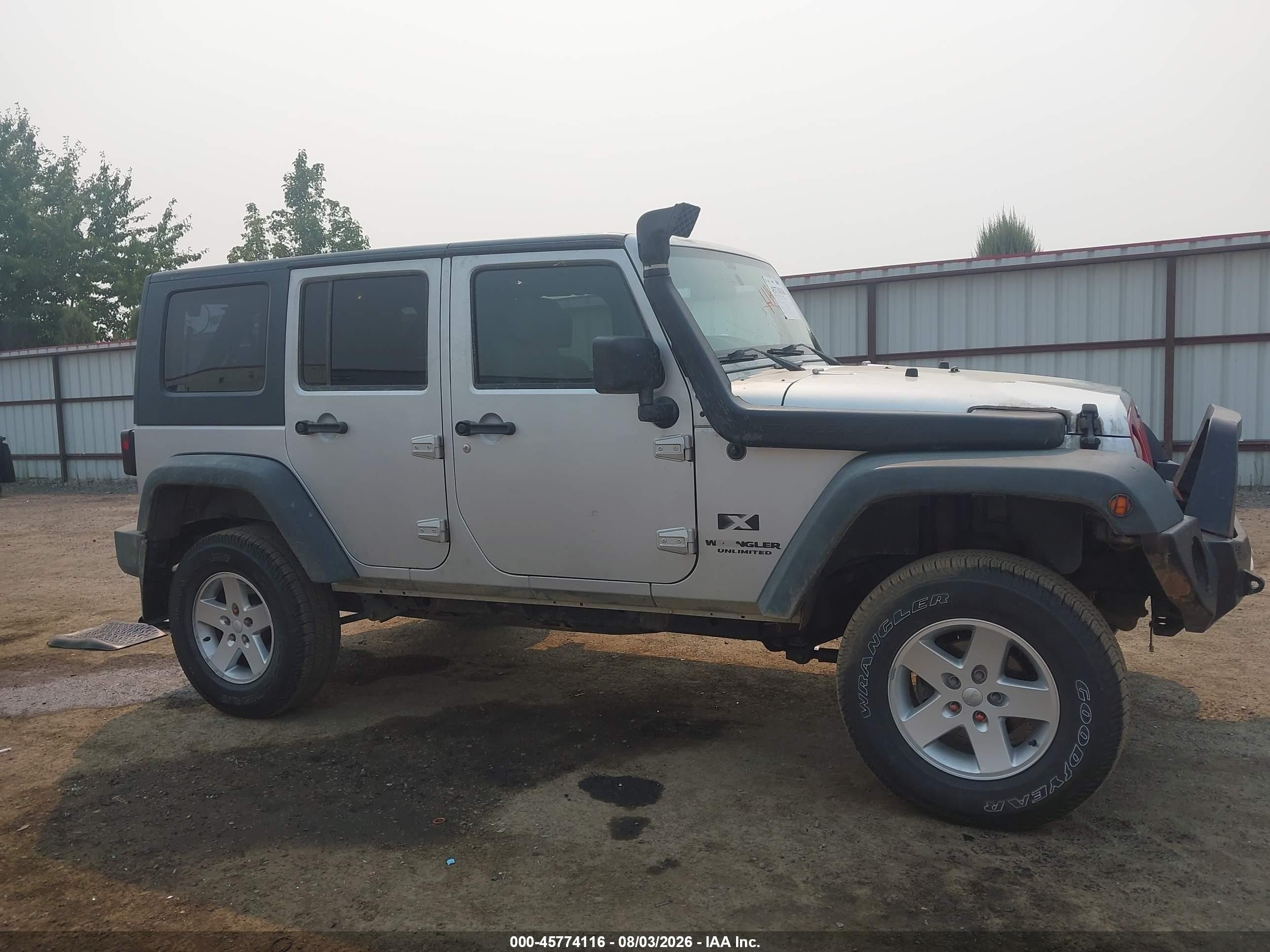 2009 Jeep Wrangler Unlimited X Silver vin: 1J4GA39119L751932