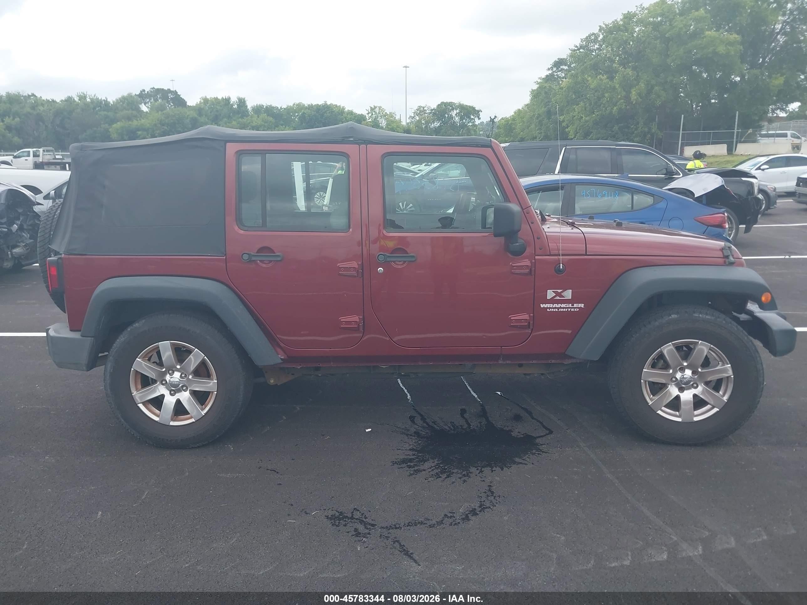 2009 Jeep Wrangler Unlimited X Burgundy vin: 1J4GA39119L759626